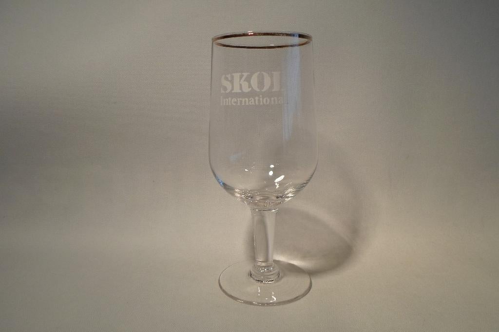 Skol International Glas Gouden Rand, Ophalen of Verzenden, Zo goed als nieuw, Glas of Glazen, Overige merken
