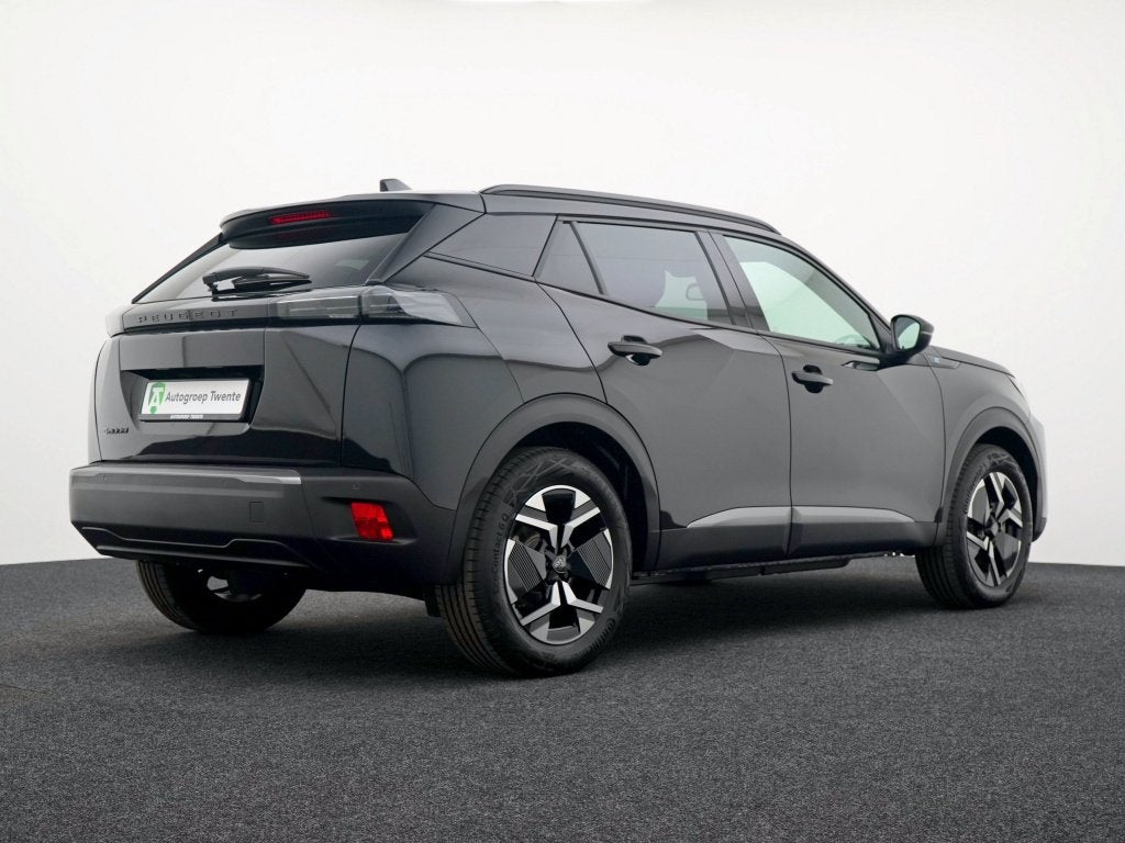 Peugeot e-2008 EV Allure 54 kWh - Private lease 549 pm, Auto's, Dealer onderhouden, 0 cilinders, Gebruikt, Zwart