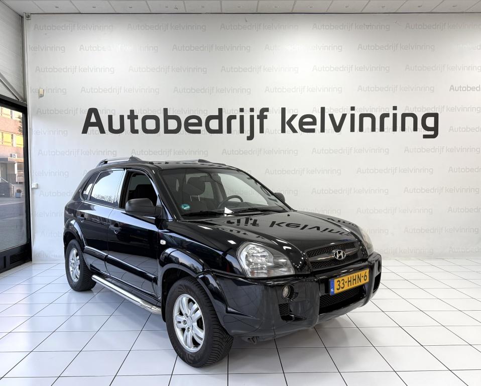 Hyundai Tucson 2.0i Dyn. Executive Bovag garantie Airco, Auto's, Hyundai, 13 km/l, Parkeersensor, Stof, Gebruikt
