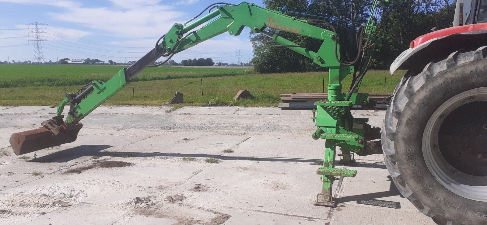 Kraantje voor in de hef van tractor., Ophalen