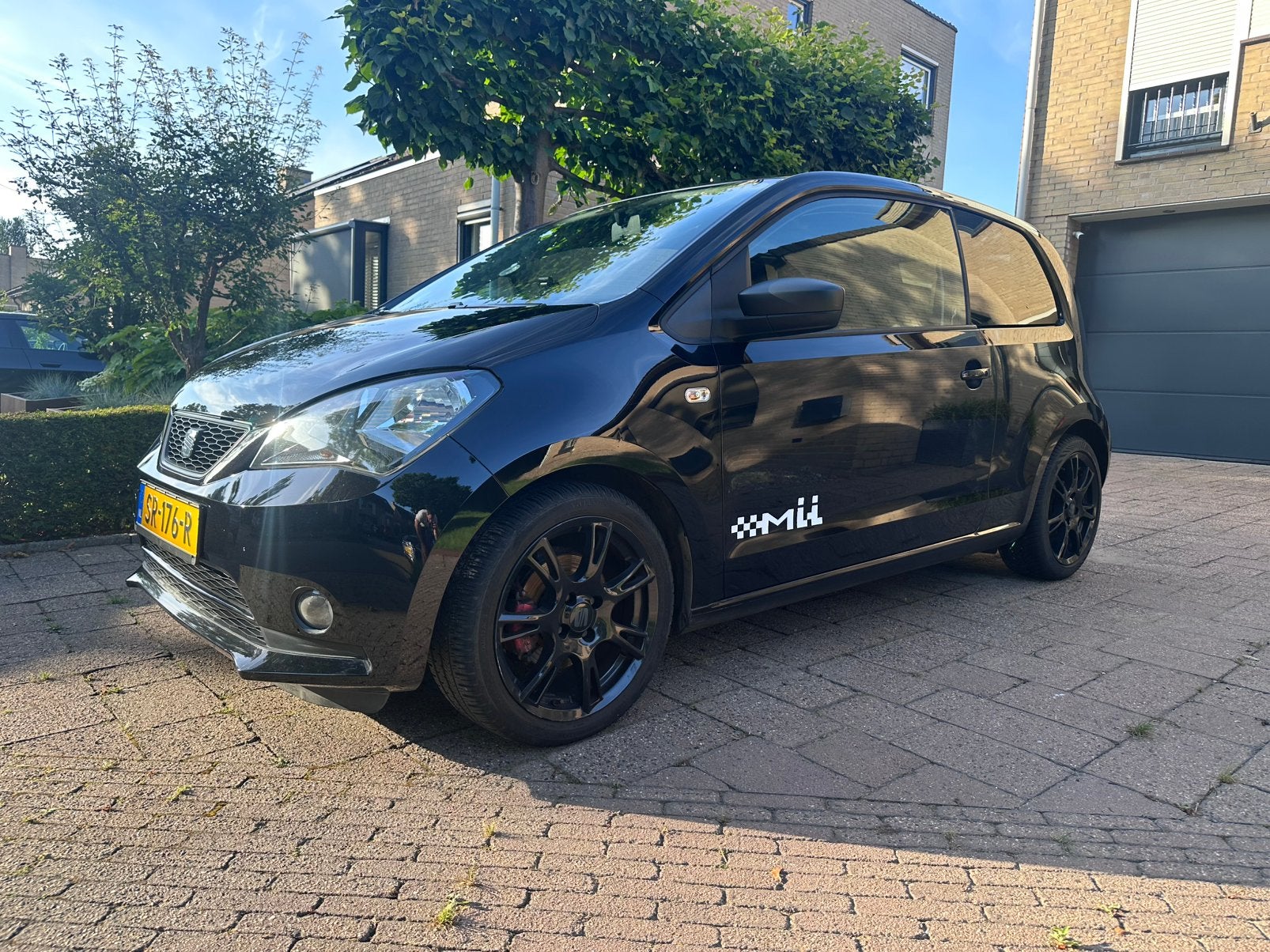 Seat Mii 1.0 55KW 2012 Zwart, Auto's, Stof, 74 pk, Zwart, 4 stoelen