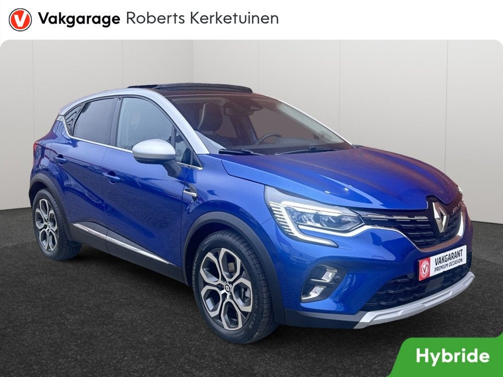 Renault Captur 1.6 E-Tech Hybride 145 Intens Panorama Schuif, Auto's, Gebruikt, Blauw, Leder en Stof, Bedrijf