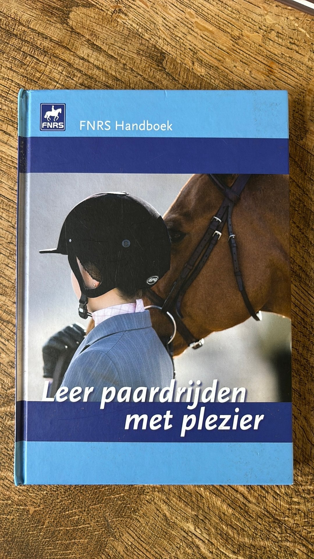 Leer paardrijden met plezier - FNRS Handboek, Ophalen of Verzenden, Zo goed als nieuw, Paarden of Pony's