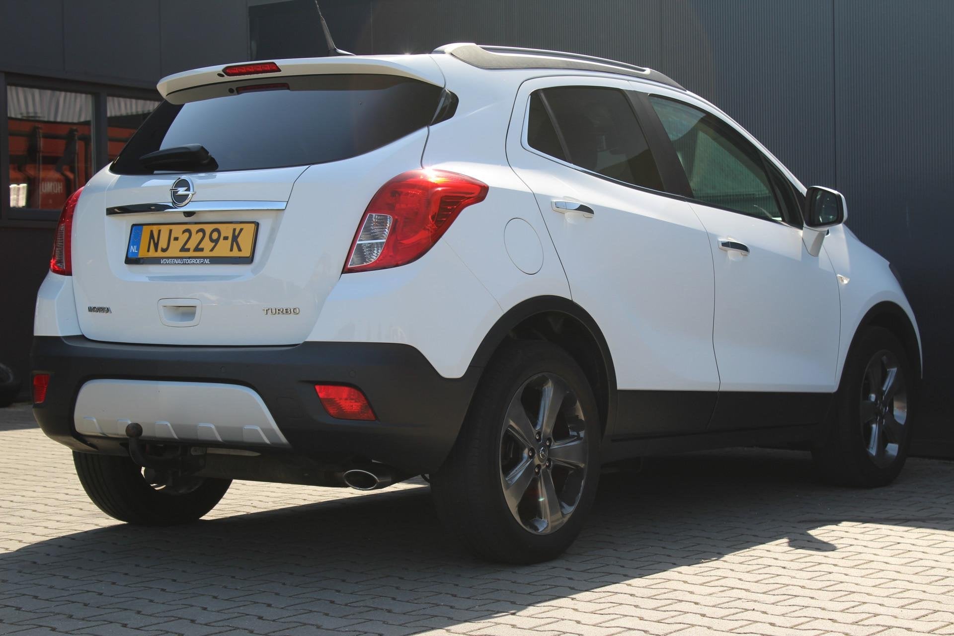 Opel Mokka 1.4 T Cosmo | Trekhaak | Stoel/stuurverwarming |, Auto's, Voorwielaandrijving, Euro 5, Gebruikt, 4 cilinders