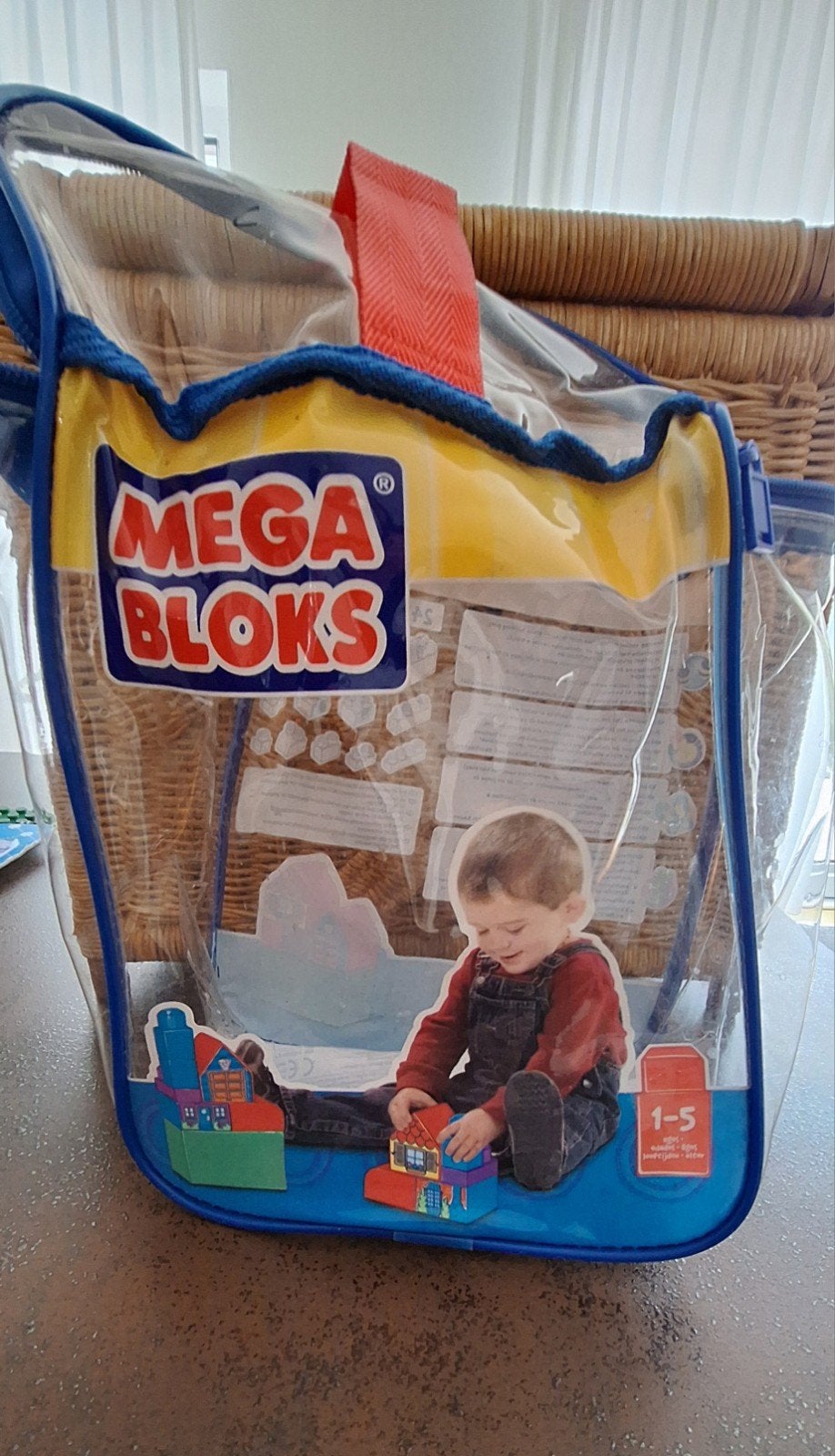 Megabloks bouwstenen met opbergbak, Ophalen