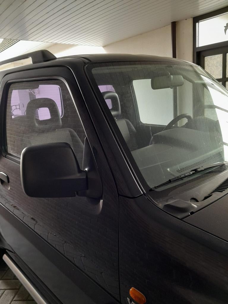 Suzuki Jimny 1.3 4WD 2005 Zwart, Stof, 40 €/maand, 4 stoelen, Zwart