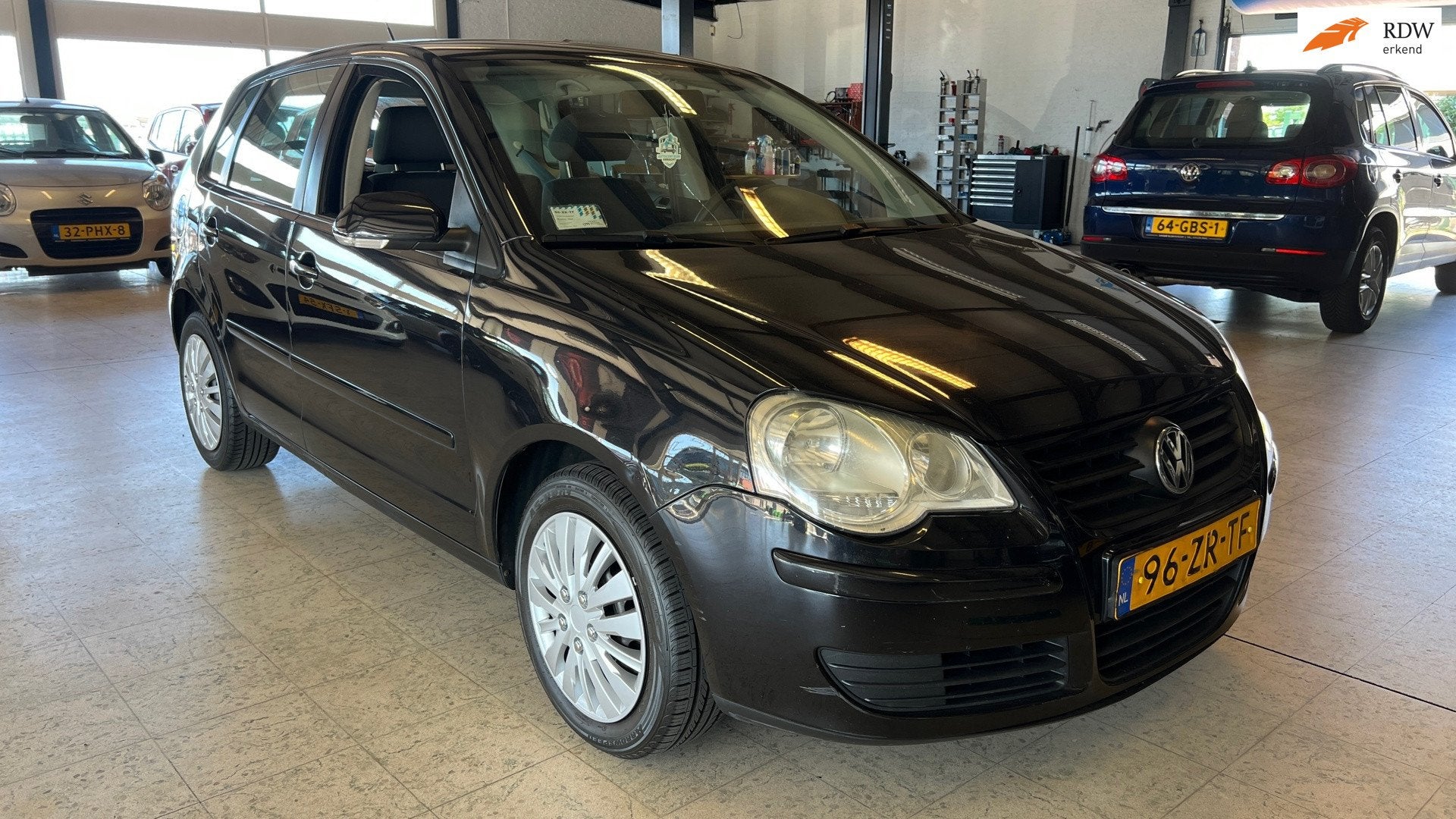 Volkswagen Polo 1.4-16V Comfortline, Auto's, Volkswagen, Voorwielaandrijving, 4 cilinders, Zwart, Bedrijf
