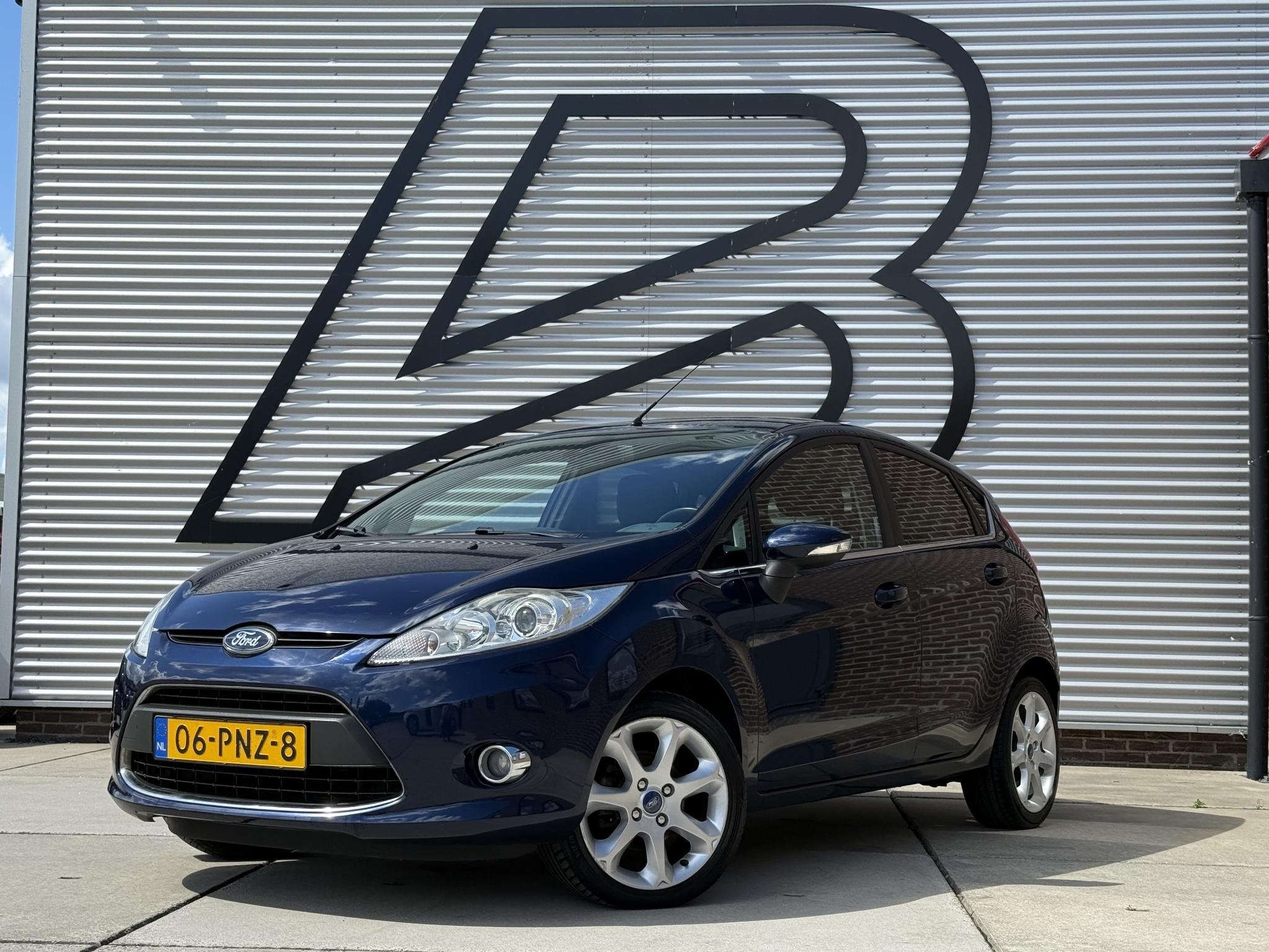 Ford Fiesta 1.25 Titanium 1e Eigenaar|Clima|Cruise|PDC|LM Ve, Auto's, Ford, Voorwielaandrijving, Stof, 1242 cc, Origineel Nederlands