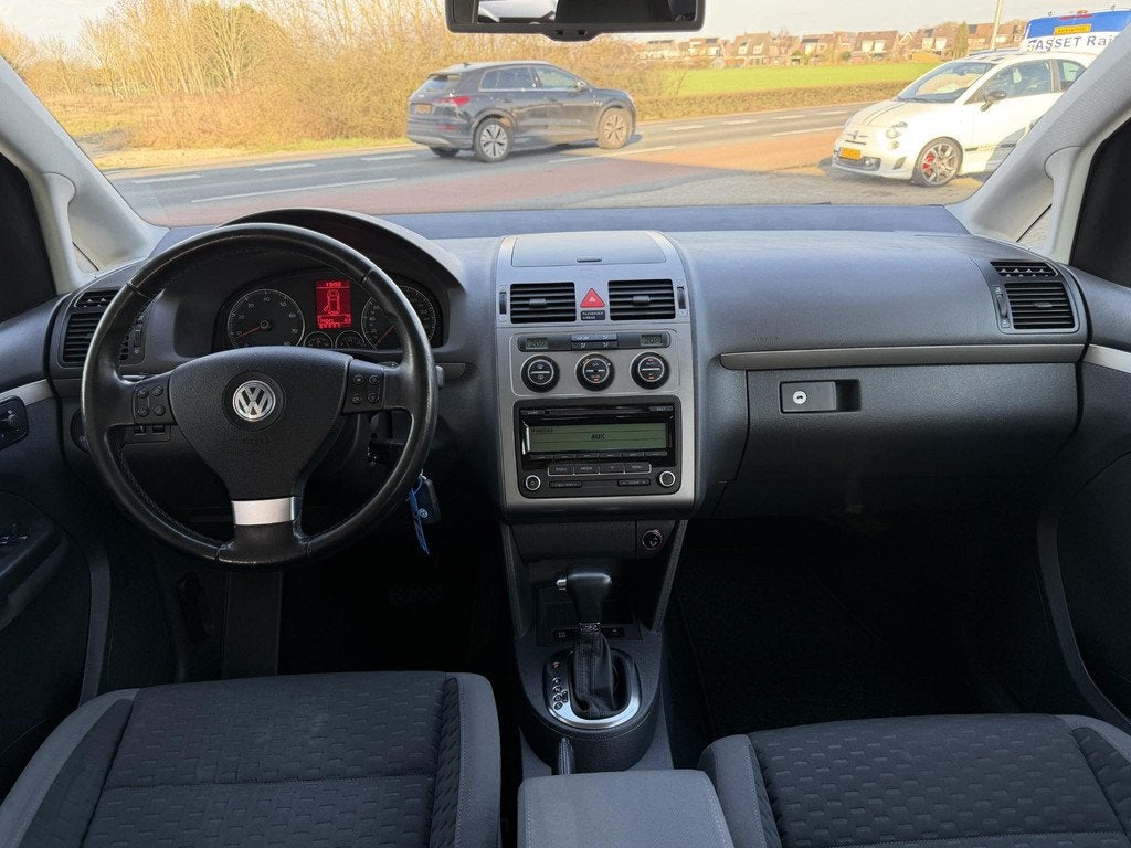 Volkswagen Touran 1.4 TSI Comfortline AIRCO | CRUISE | BOVAG, Auto's, Volkswagen, Stof, Gebruikt, Zwart, 4 cilinders