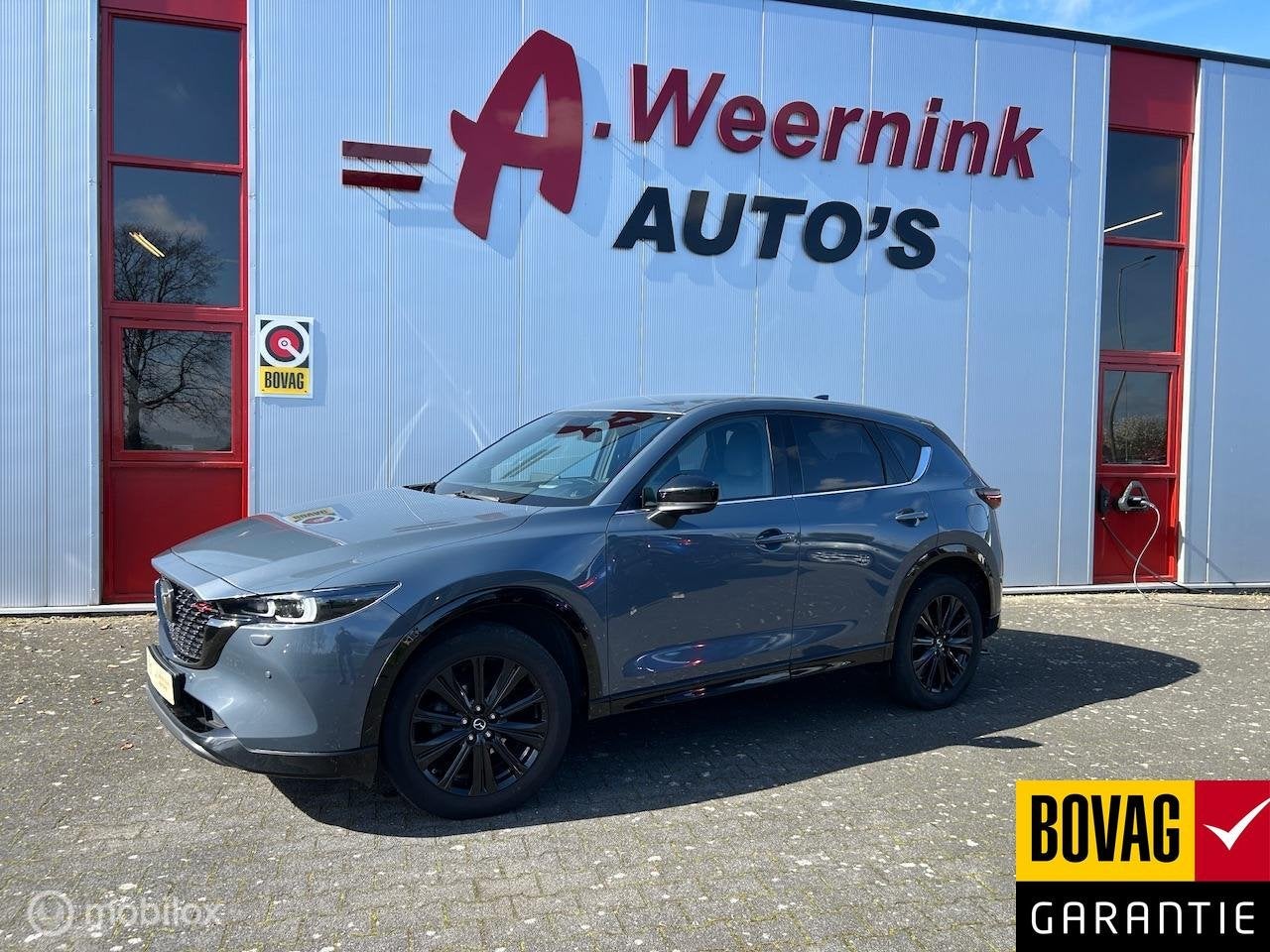 Mazda CX-5 2.0 SkyActiv-G 165 Homura Limited, Gebruikt, Zwart, 1507 kg, 14 km/l
