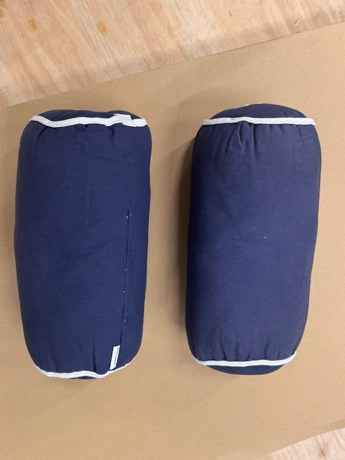 2x Donkerblauwe rolkussens van Protecq, Overige merken, Gebruikt, Blauw, Ophalen of Verzenden