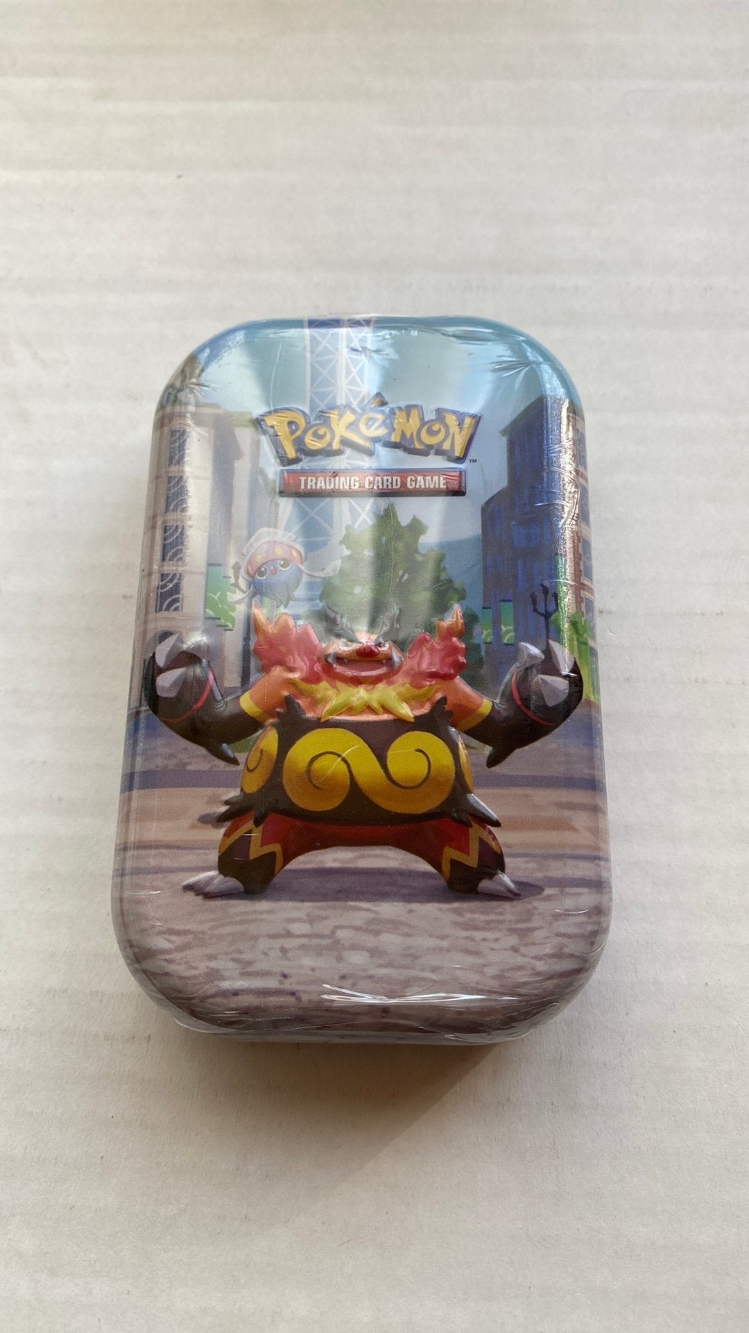 Pokemon mini tin, Hobby en Vrije tijd, Ophalen of Verzenden, Nieuw, Booster, Foil