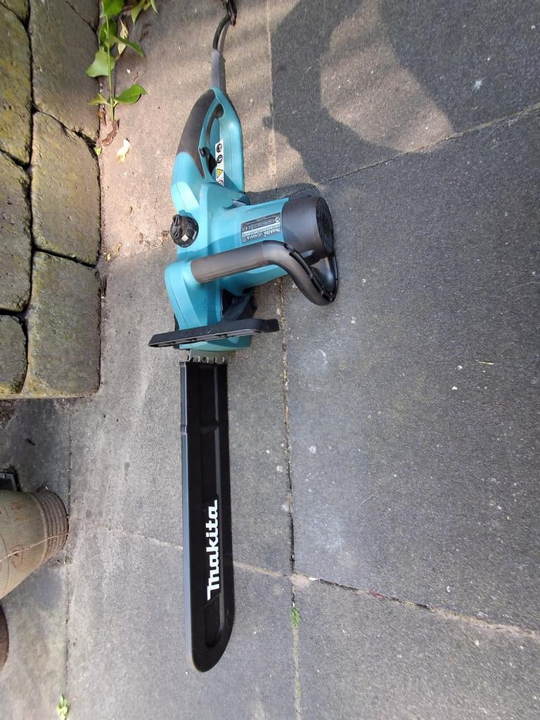 Makita elektrische kettingzaag met accessoires, Doe-het-zelf en Verbouw, Gereedschap | Zaagmachines, Ophalen, 70 mm of meer, Kettingzaag