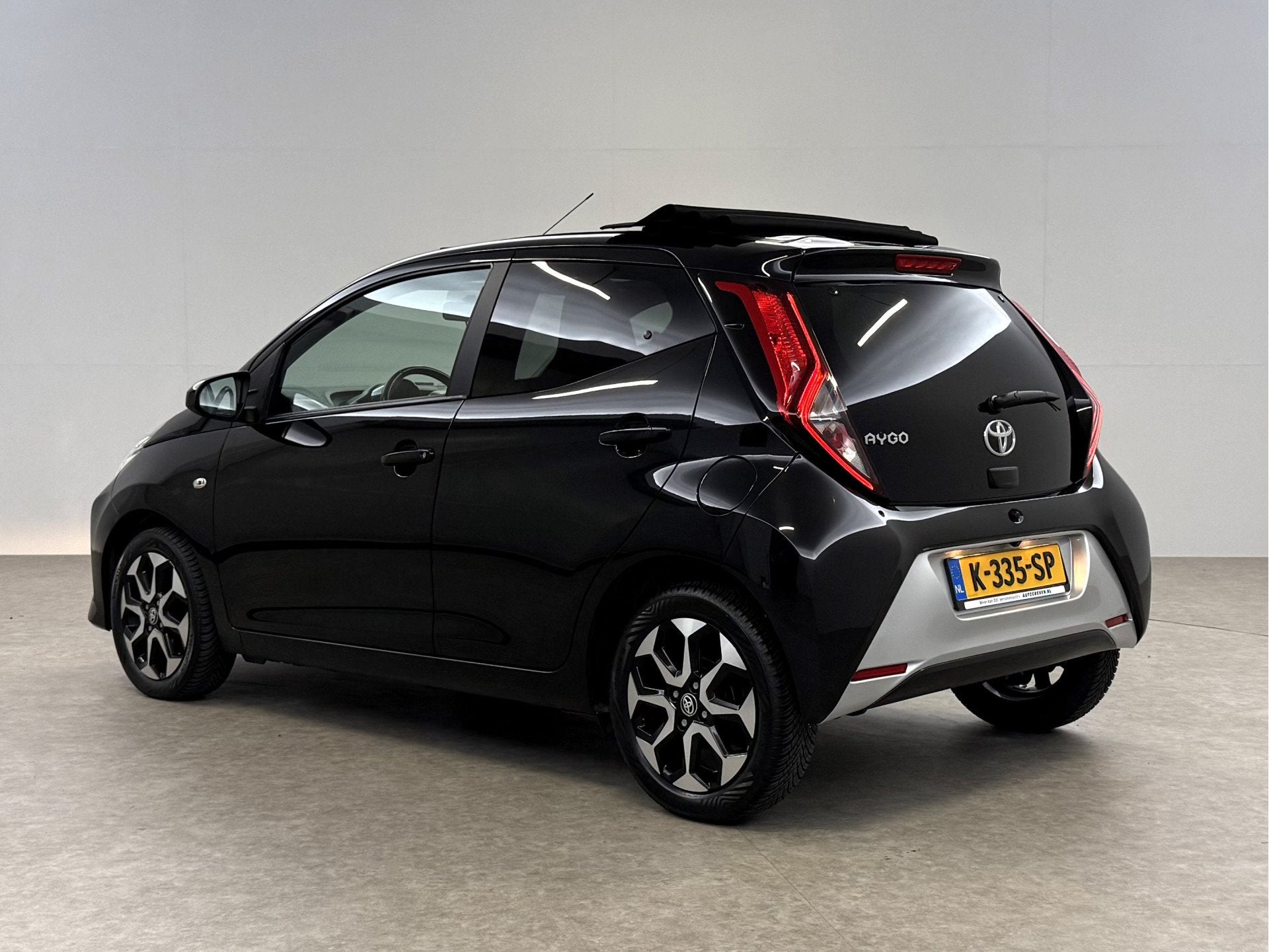 Toyota Aygo 1.0 x-joy Cabrio | Open dak | Clima | Cruise | C, Auto's, Toyota, Voorwielaandrijving, Stof, Gebruikt, Euro 6