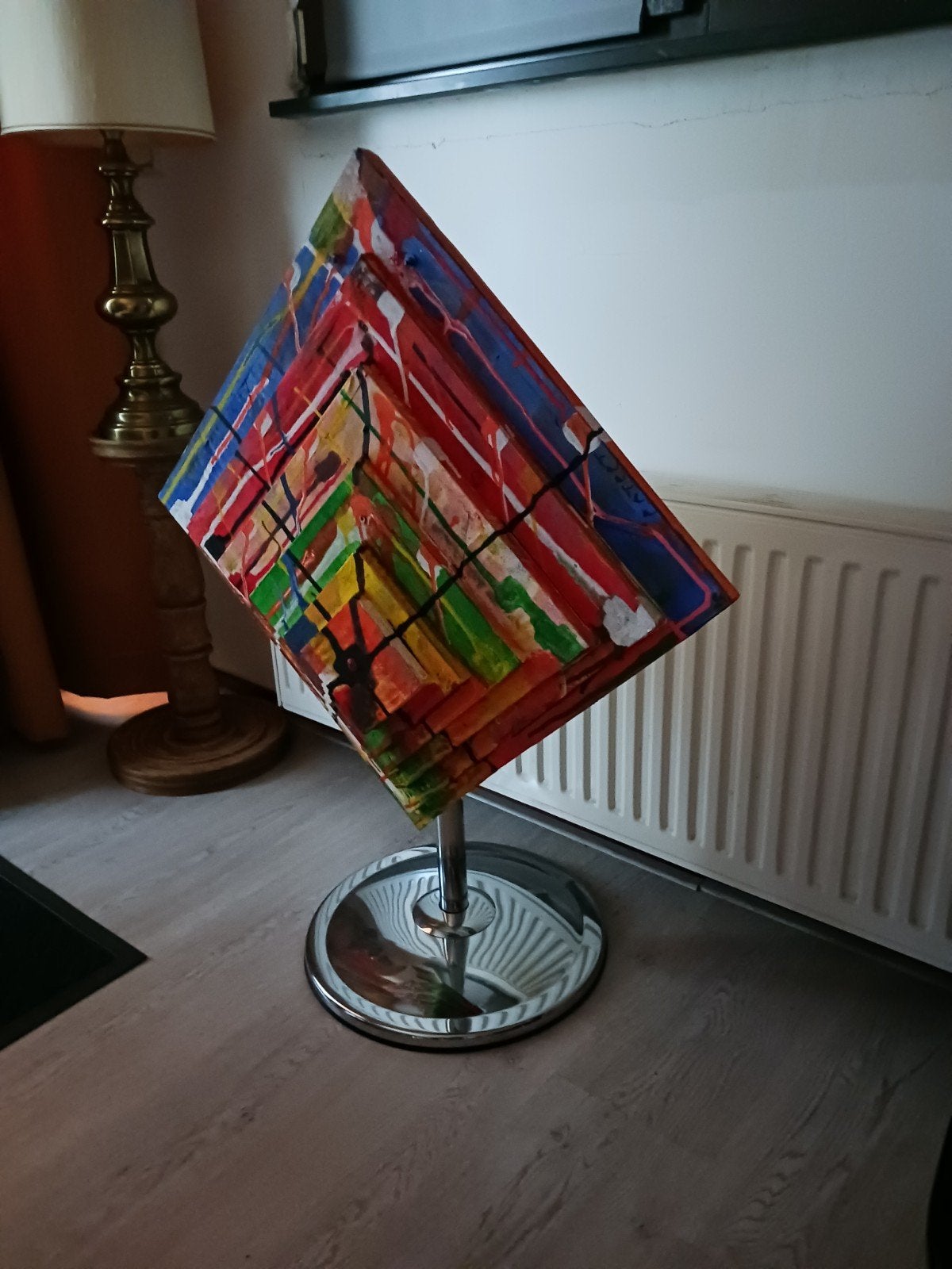 Abstract schilderij op standaard, Ophalen