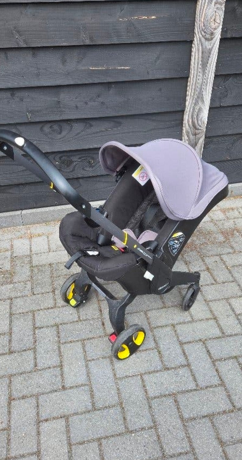 Doona autostoel maxicosi kinderwagen en isofix systeem, Ophalen, Zo goed als nieuw, Overige merken