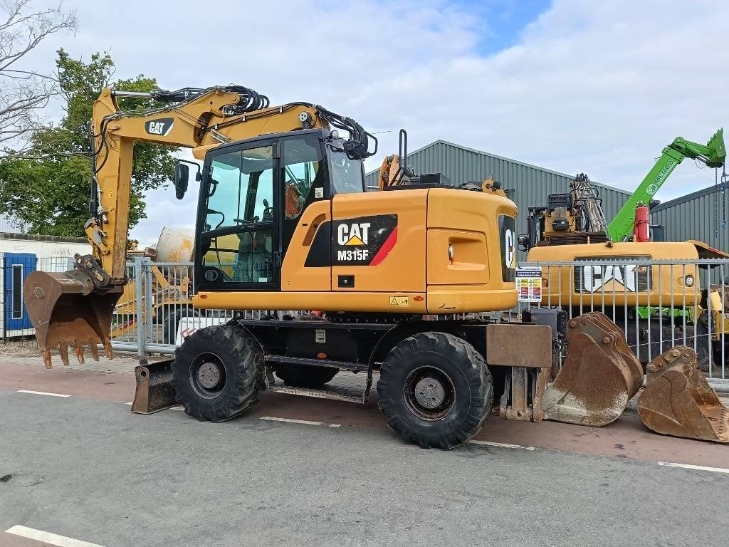 Cat M 315 F mobiele graafmachine excavator bagger (bj 2017), Graafmachine