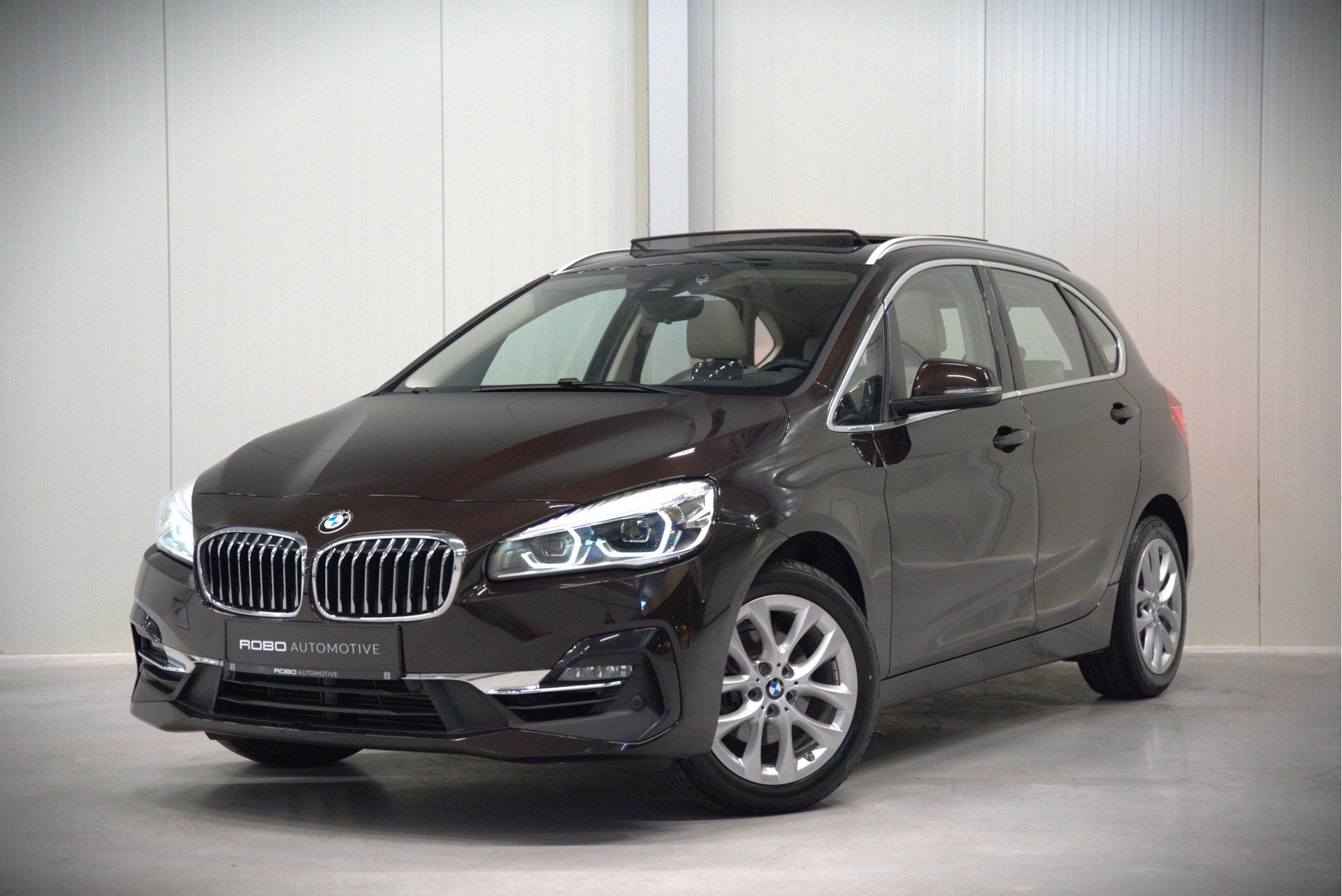 BMW 2 Serie Active Tourer 218i High Executive Luxury Line |, Auto's, Automatische klimaatregeling, Gebruikt, Euro 6, Bruin