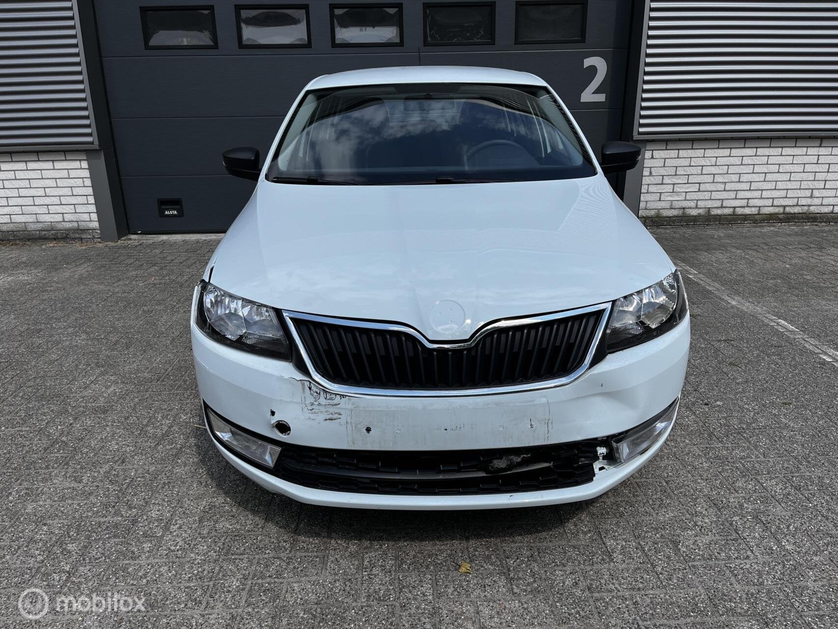 Skoda Rapid 1.2 TSI Greentech Edition, Auto's, Stof, Gebruikt, Zwart, 4 cilinders