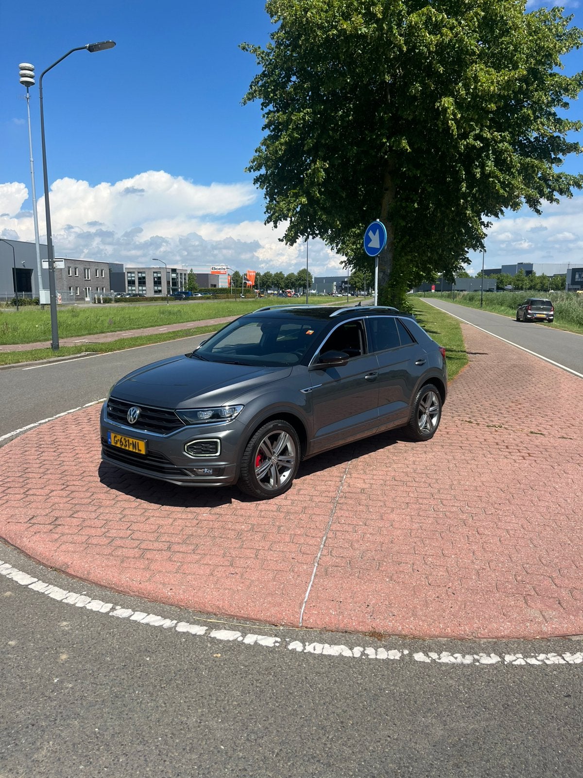 Volkswagen T-Roc 1.5 TSI 150pk 2019 Grijs, Auto's, 15 km/l, 1498 cc, 4 cilinders, Leder en Stof