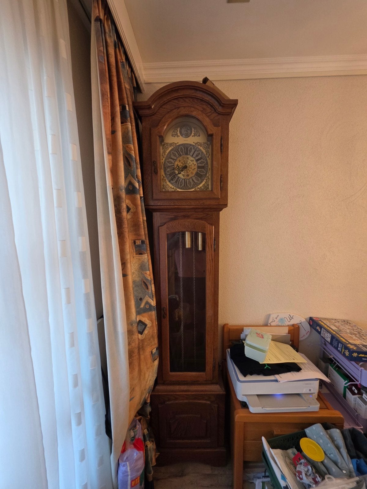 Interclock staande klok met gewichten en klepel, Ophalen