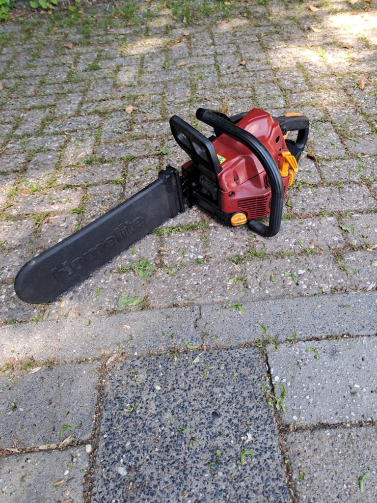 Benzine kettingzaag, Ophalen of Verzenden, Gebruikt, 30 t/m 39 mm, Homelite