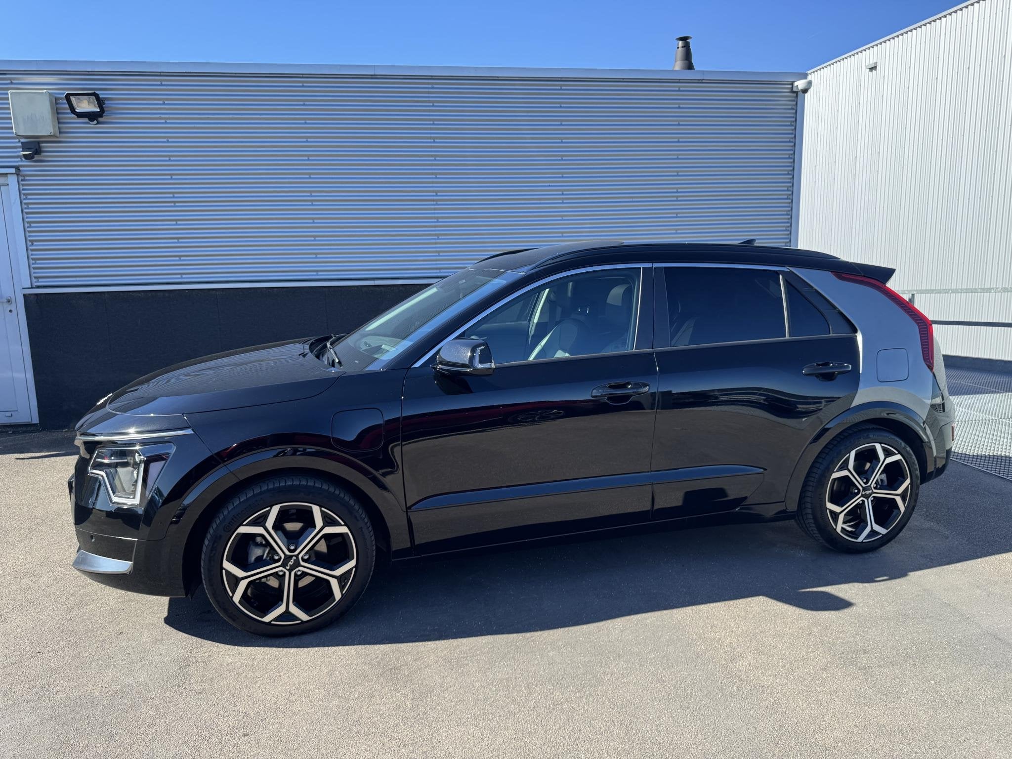 Kia Niro 1.6 GDi PHEV ExecutiveLine Schuif/kanteldak, Trekha, Auto's, Dealer onderhouden, Gebruikt, Euro 6, Zwart