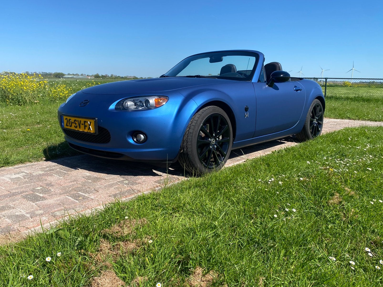 Mazda MX5 1.8 Touring 2006 van 1e  eigenaar., Auto's, Mazda, Zwart, Cabriolet, Blauw, Elektrische ramen