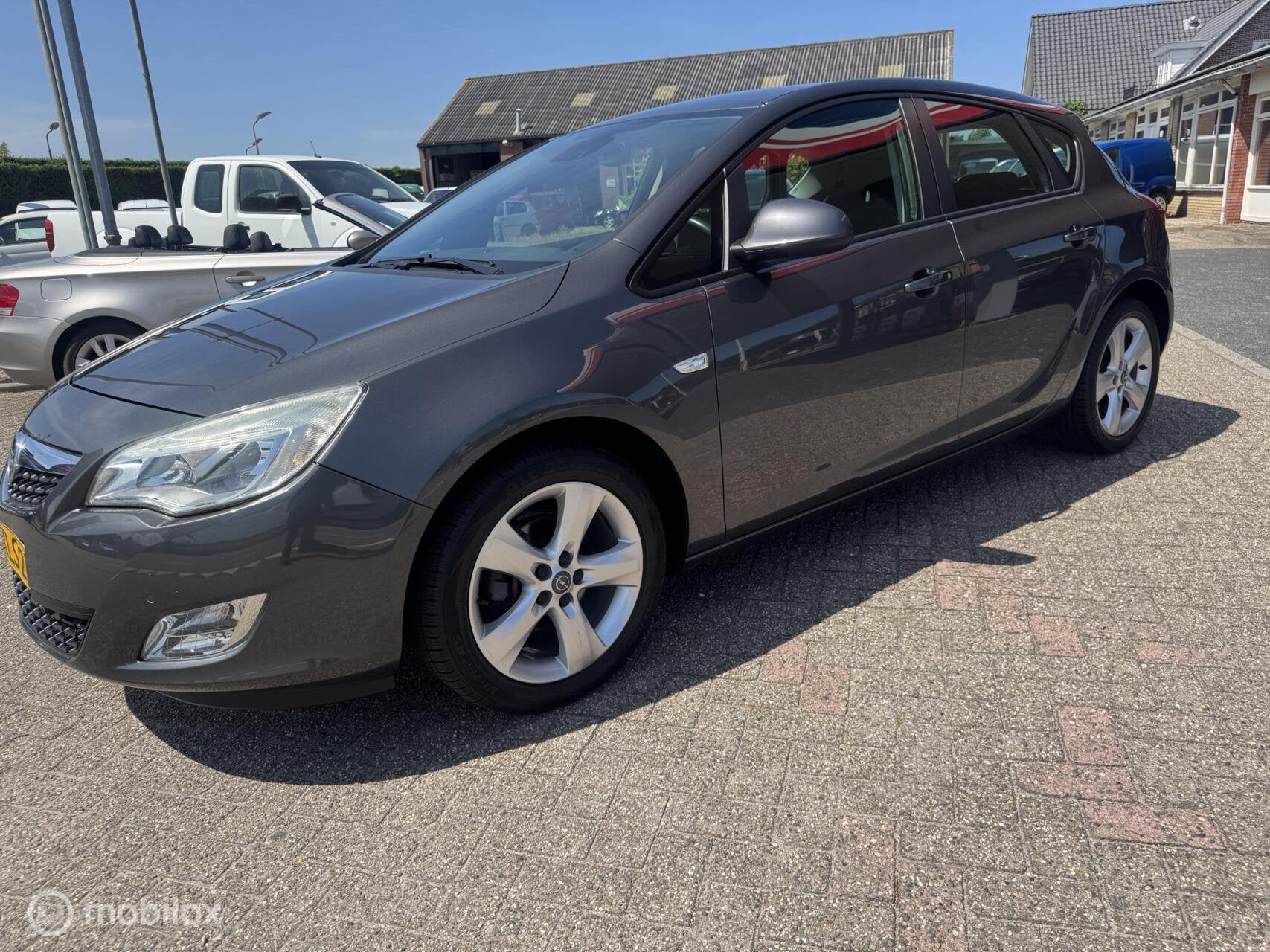 Opel Astra 1.6 Cosmo, Auto's, Opel, Voorwielaandrijving, Euro 5, 1250 kg, 680 kg
