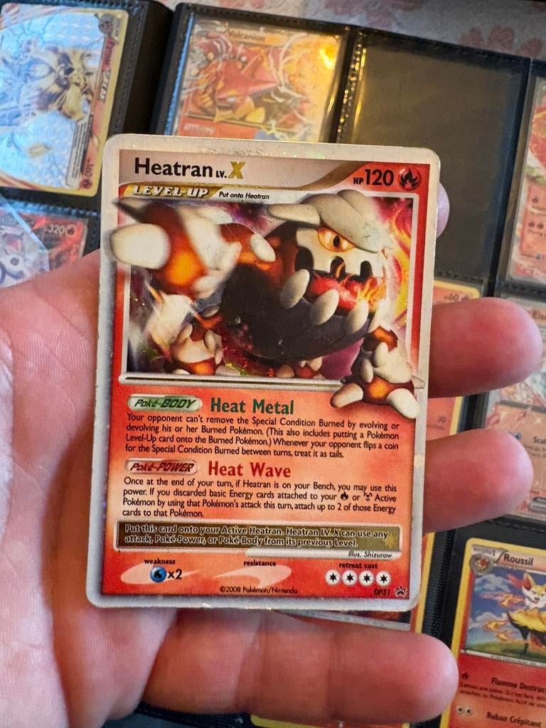 Heatran lv x, Ophalen of Verzenden, Zo goed als nieuw, Meerdere kaarten, Foil