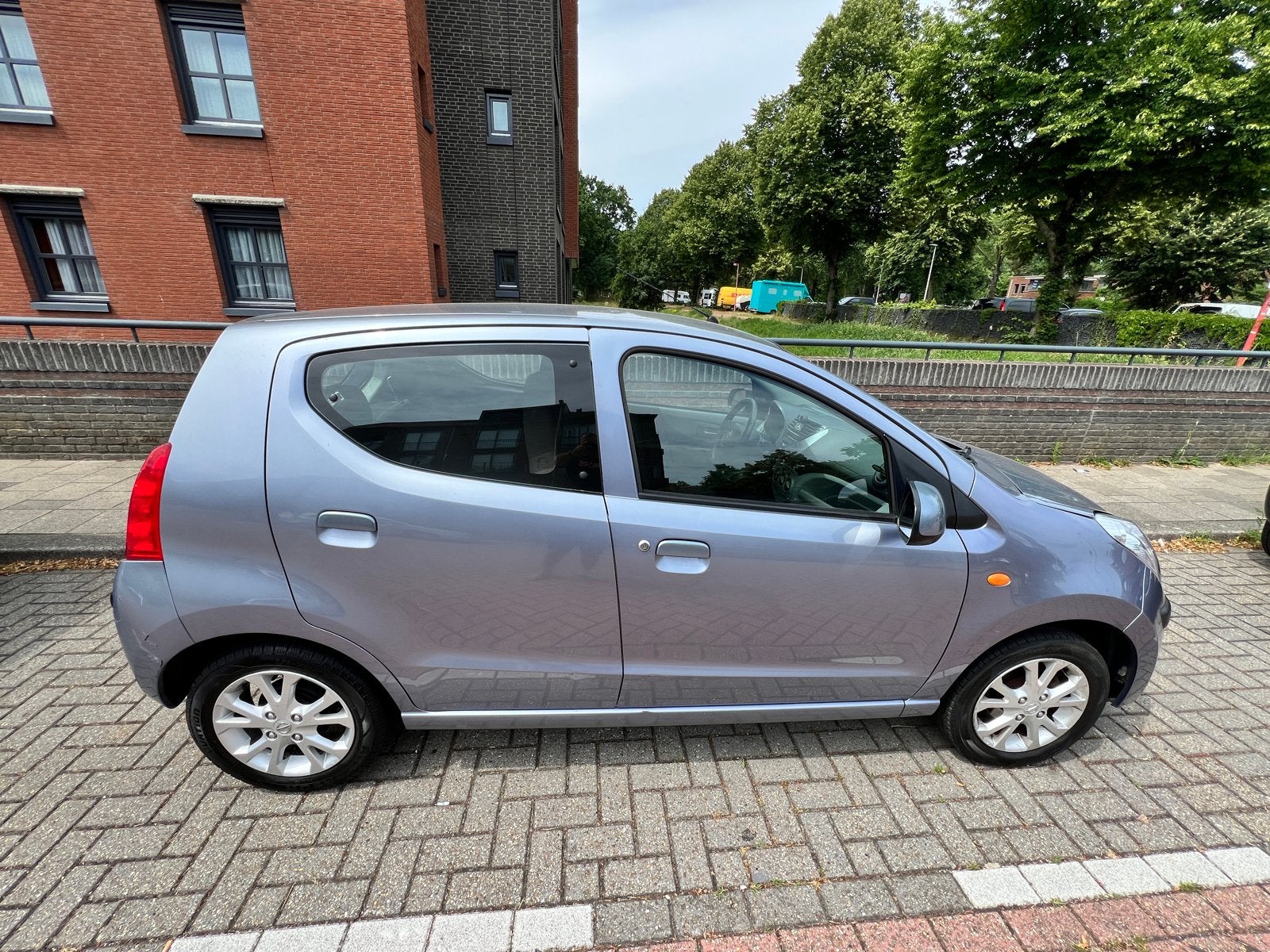 Nissan Pixo 1.0 50KW 5D 2010 Grijs Nieuwe APK AIRCO IJSKOUD, Auto's, Nissan, Voorwielaandrijving, 200 kg, 4 stoelen, Origineel Nederlands