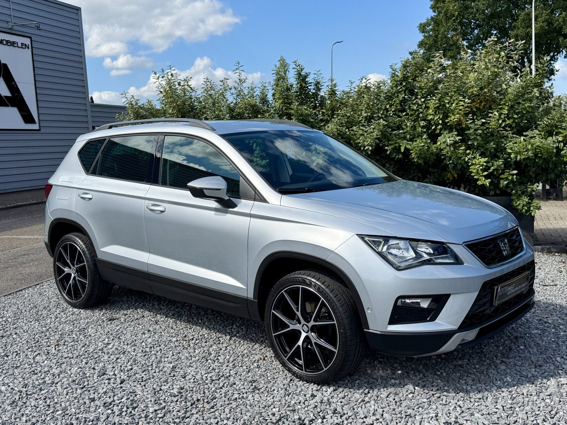 SEAT Ateca EcoTSI Style Navi|Camera|Carplay|Cruis Grijs, Auto's, Voorwielaandrijving, Dealer onderhouden, Stof, Gebruikt