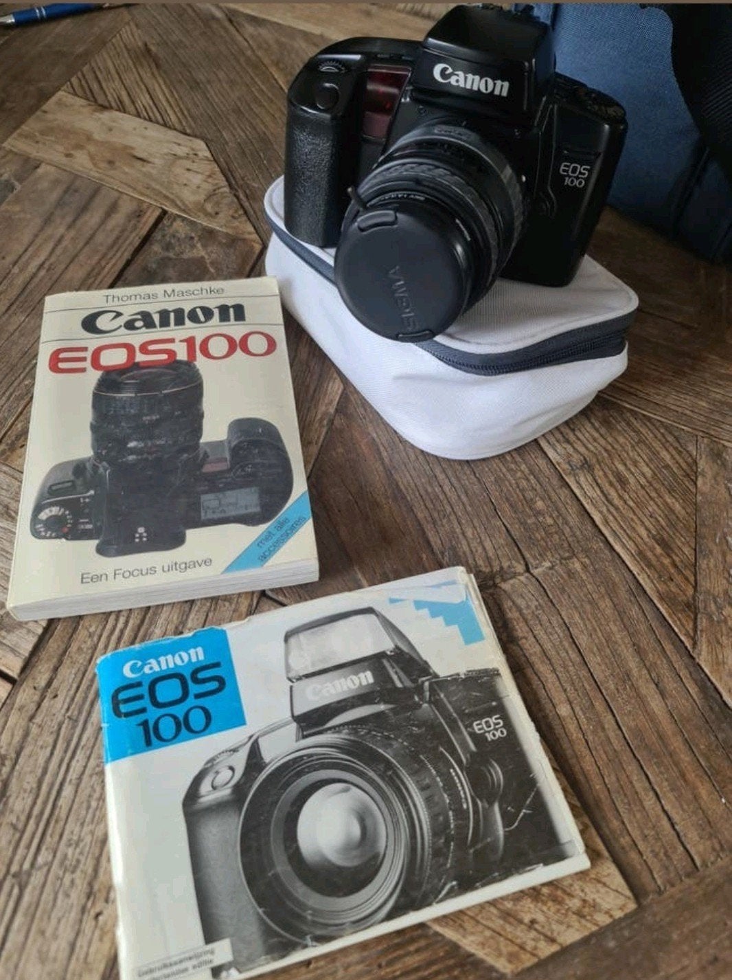 Canon EOS 100 spiegelreflexcamera met lens en boekjes, Ophalen of Verzenden, Gebruikt, Spiegelreflex, Canon