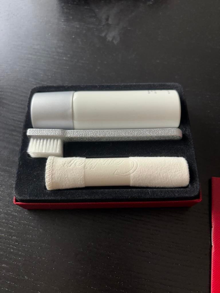 Cartier schoonmaakset met boekje (licht beschadigd), Ophalen of Verzenden, Staal, Overige merken