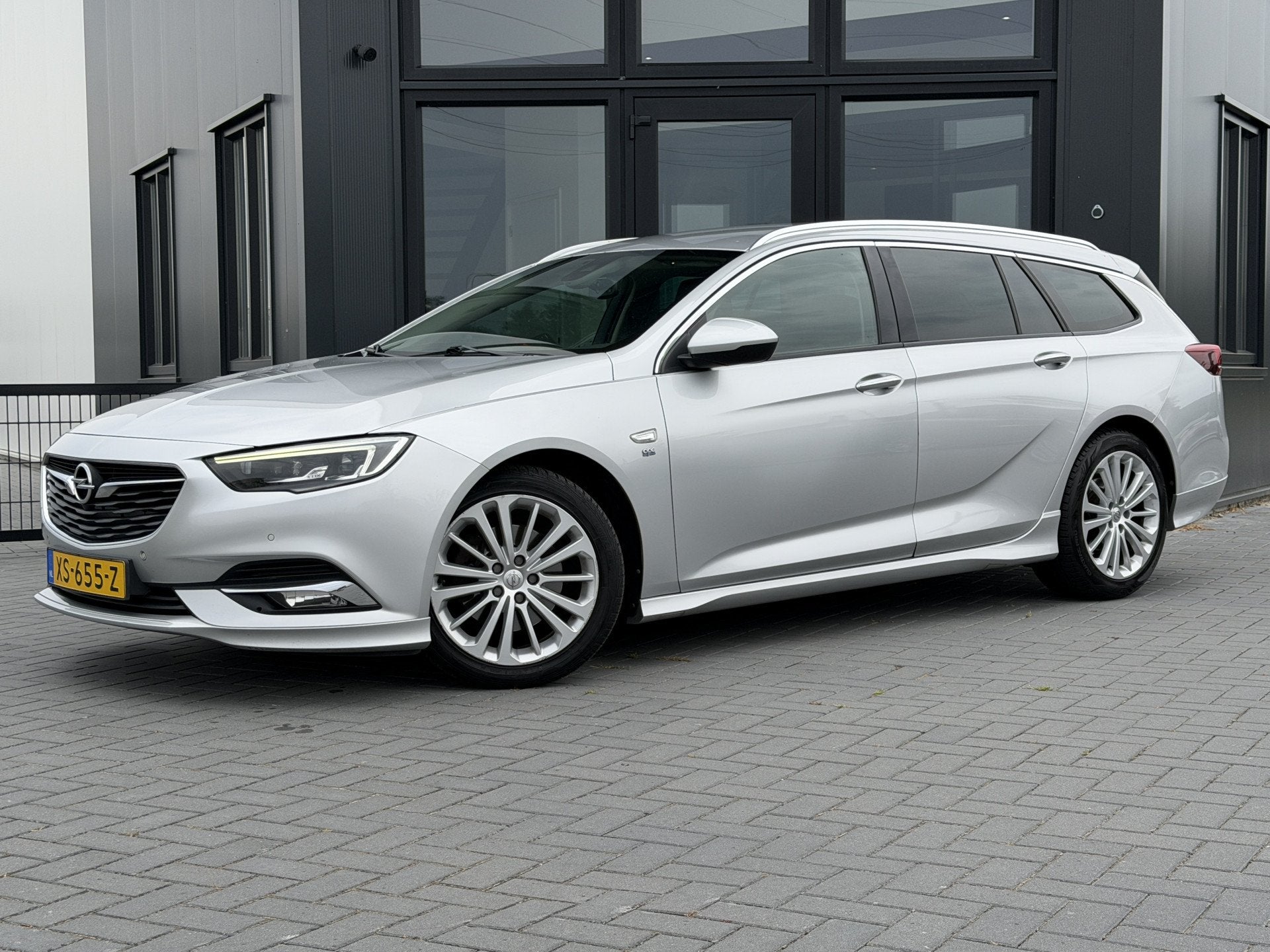 Opel Insignia Sports Tourer 1.5 Turbo Innovation OPC line |, Gebruikt, 4 cilinders, 1405 kg, Zilver of Grijs