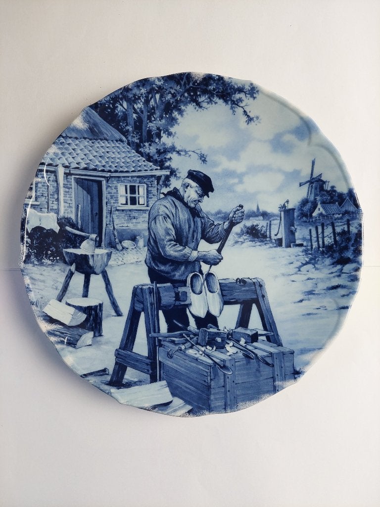 Groot wandbord van de Klompenmaker in Delfts blauw, Ophalen