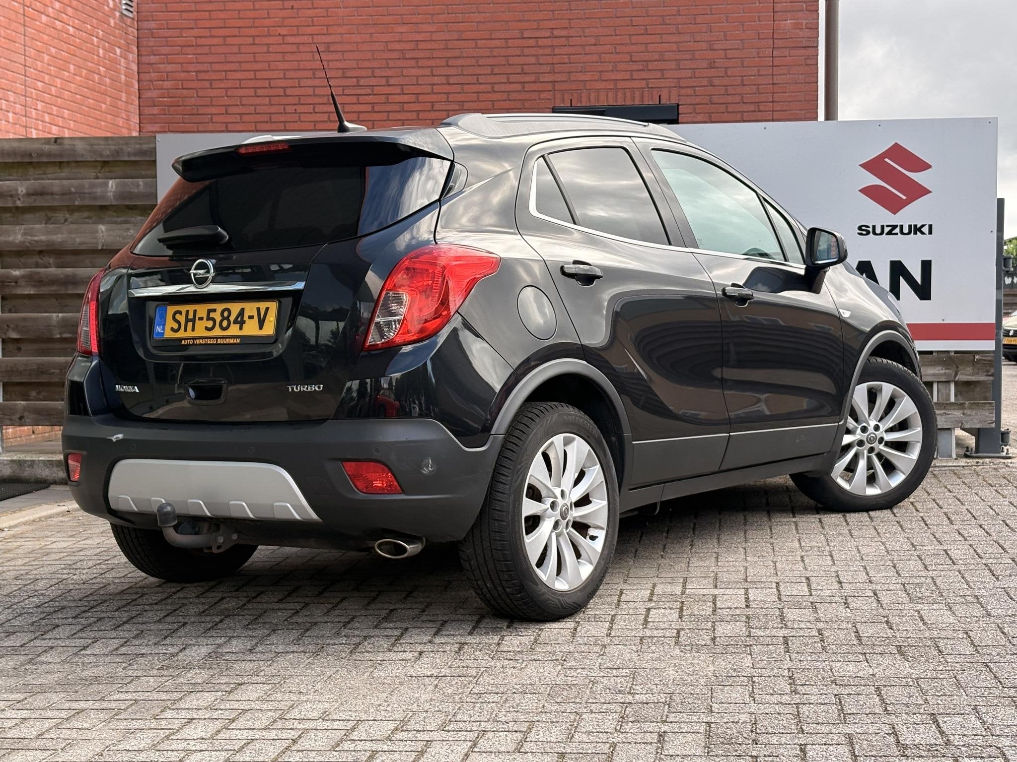 Opel Mokka 1.4 T Cosmo, Auto's, 15 km/l, Gebruikt, Zwart, Leder