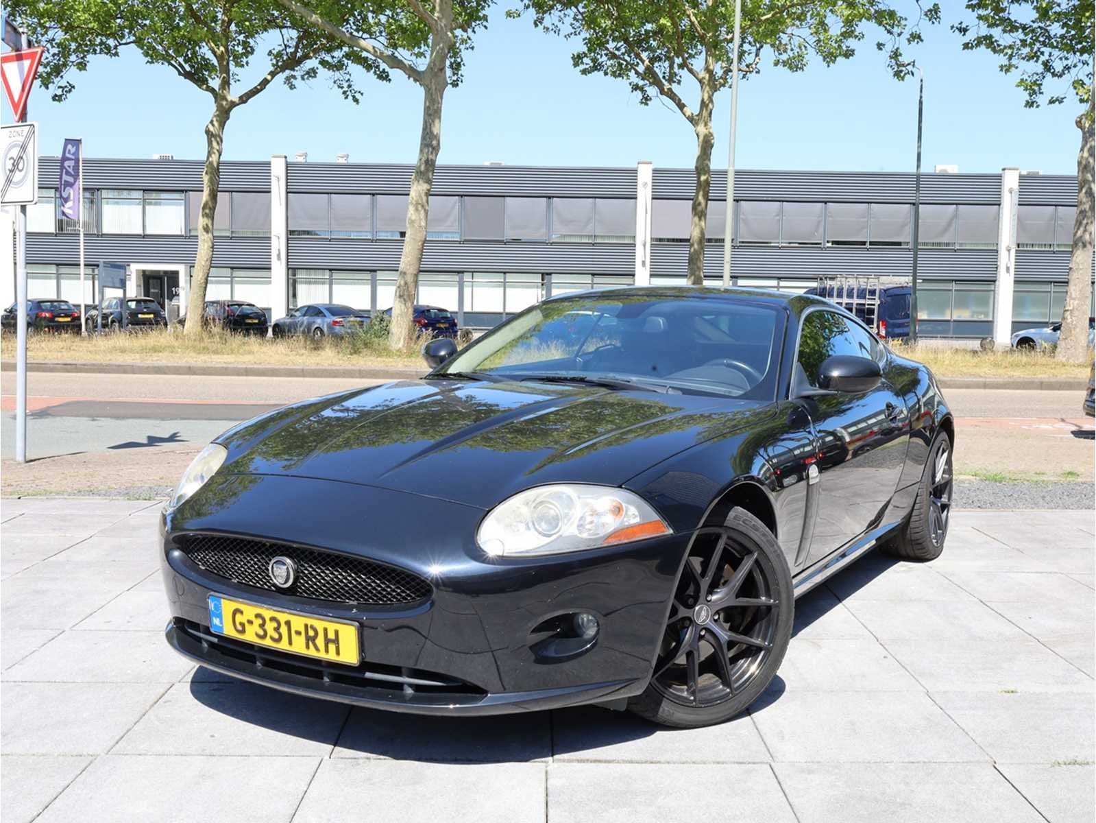 Jaguar XK 4.2 V8 Coupé Automaat 2006, G-331-RH, Auto's, Jaguar, Achterwielaandrijving, Gebruikt, 8 cilinders, Cabriolet