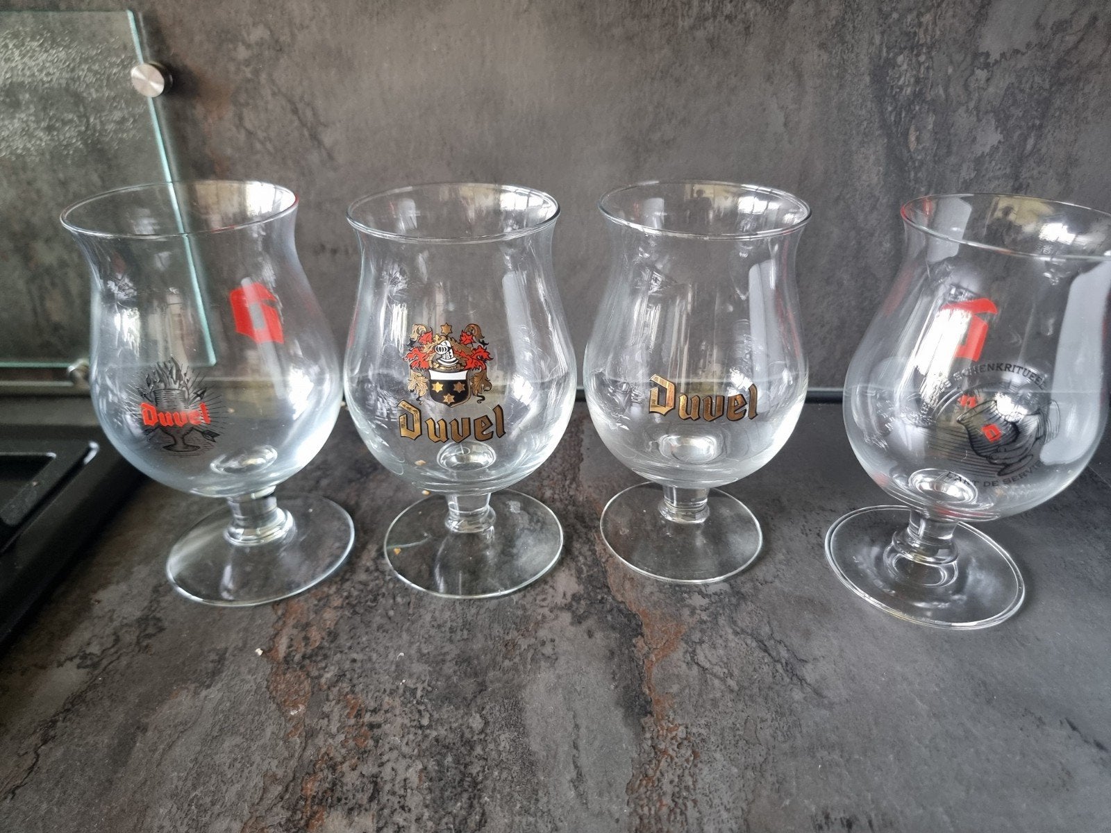 Set van 4 Duvel bierglazen - Diverse uitvoeringen, Verzenden, Nieuw, Glas of Glazen, Duvel