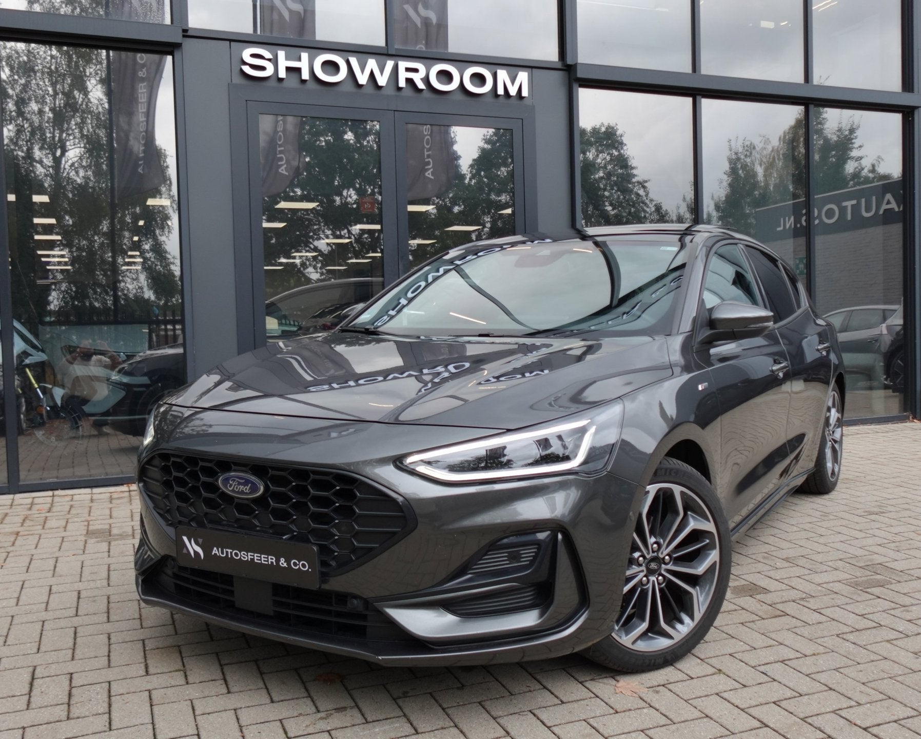 Ford Focus 1.0 EcoBoost Hybrid ST Line PANO KEYLESS B&O, Auto's, Ford, Dealer onderhouden, Gebruikt, Zwart, Bedrijf