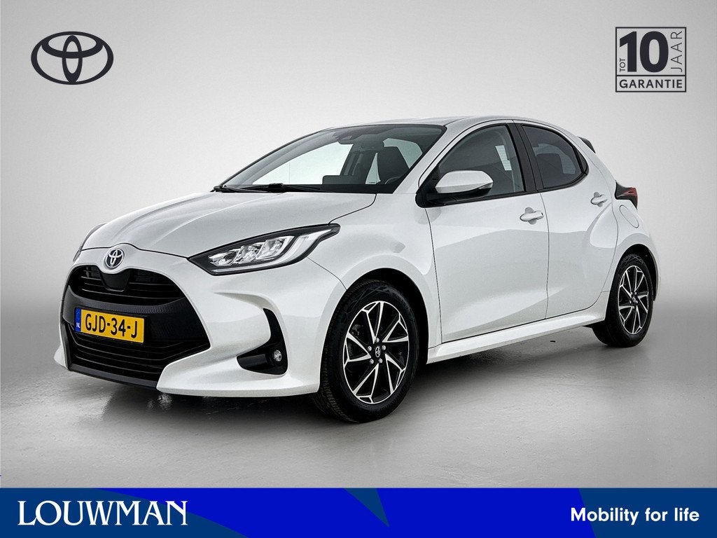 Toyota Yaris 1.5 Hybrid Dynamic | Stoelverwarming |, 12 maanden, Gebruikt, Wit, 1490 cc