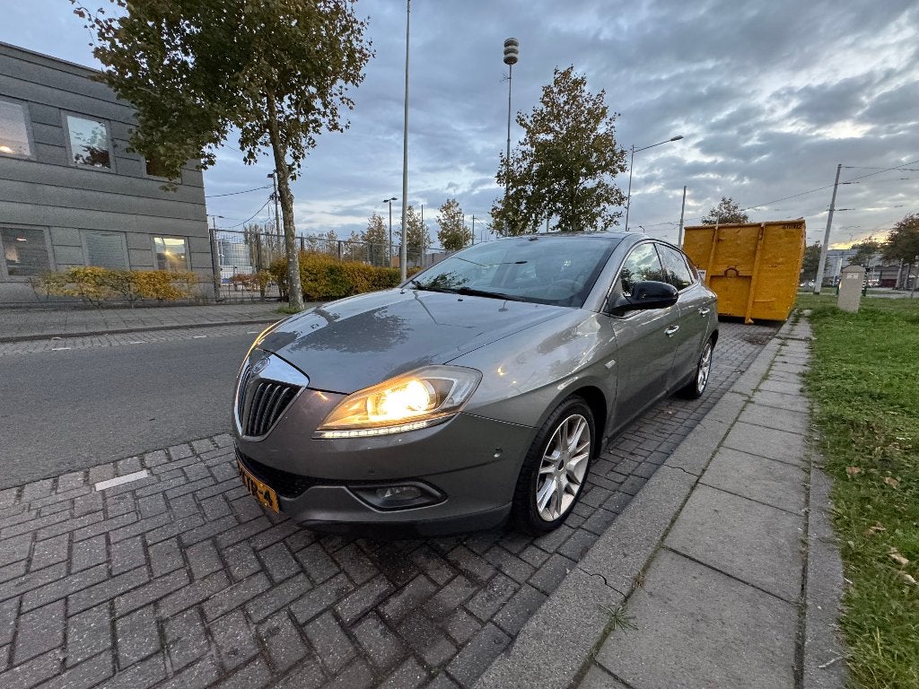 Lancia Delta 1.4 Tjet 150 2010 Grijs, Auto's, Voorwielaandrijving, 15 km/l, 4 cilinders, Origineel Nederlands