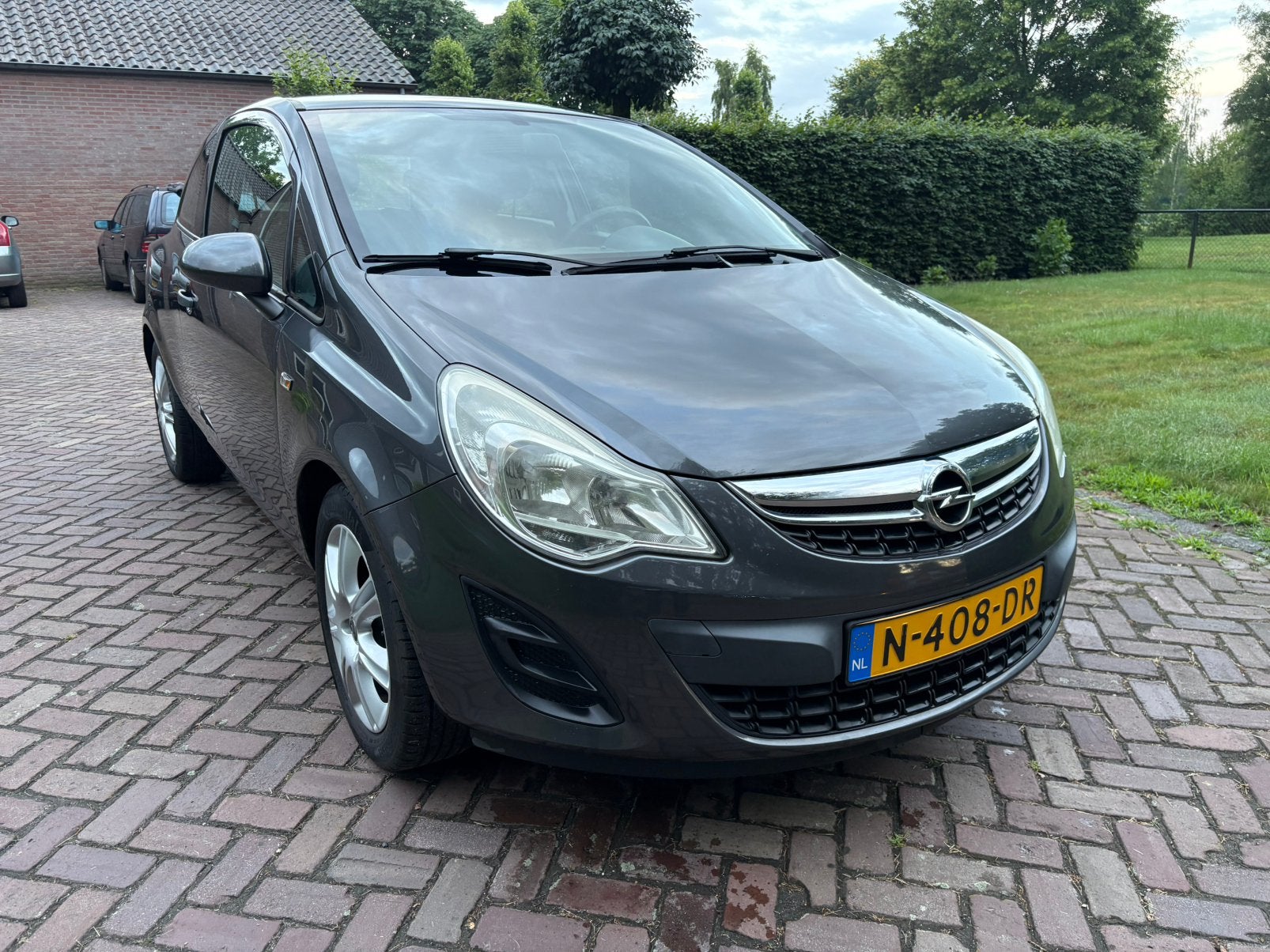 Opel Corsa 1.2 Ecoflex 51KW 3D 2011 Grijs, Auto's, Voorwielaandrijving, 40 €/maand, 1229 cc, Handgeschakeld