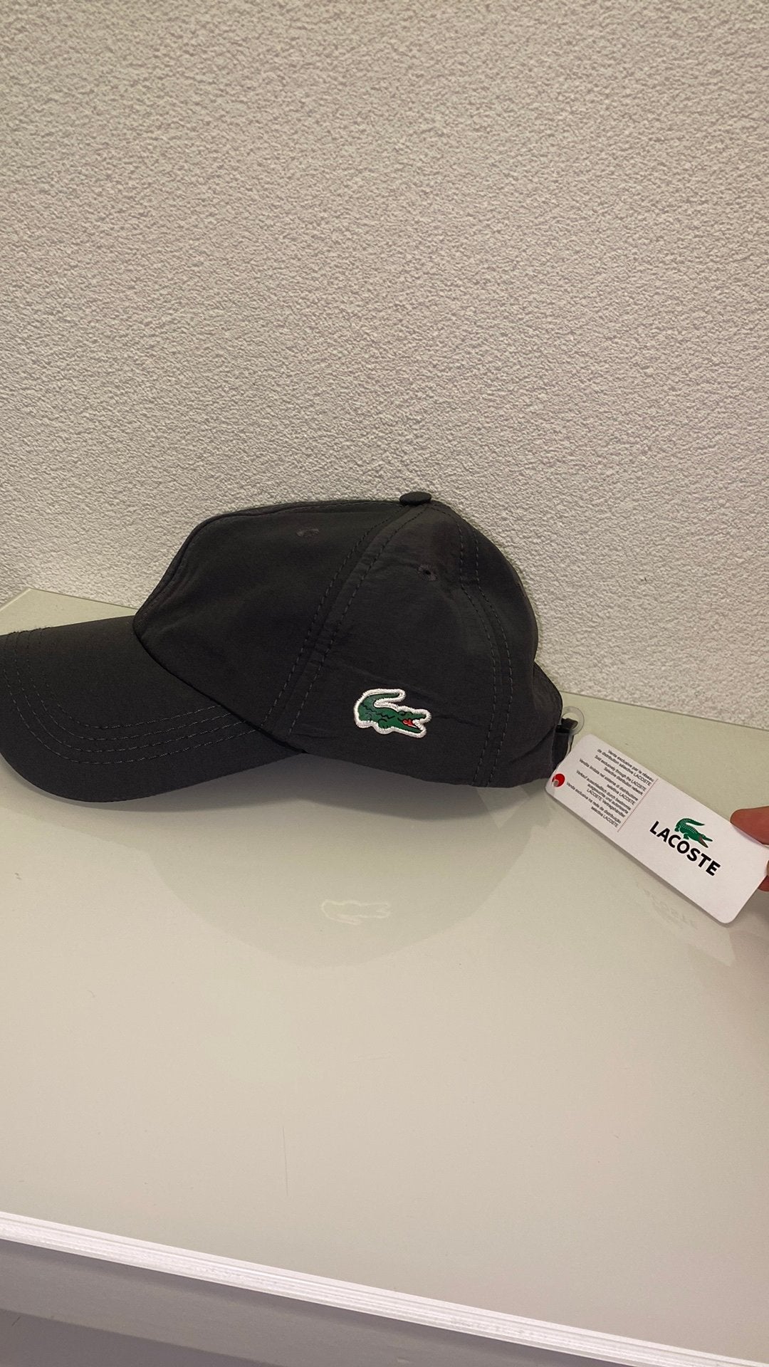Lacoste pet, Ophalen of Verzenden, Zo goed als nieuw