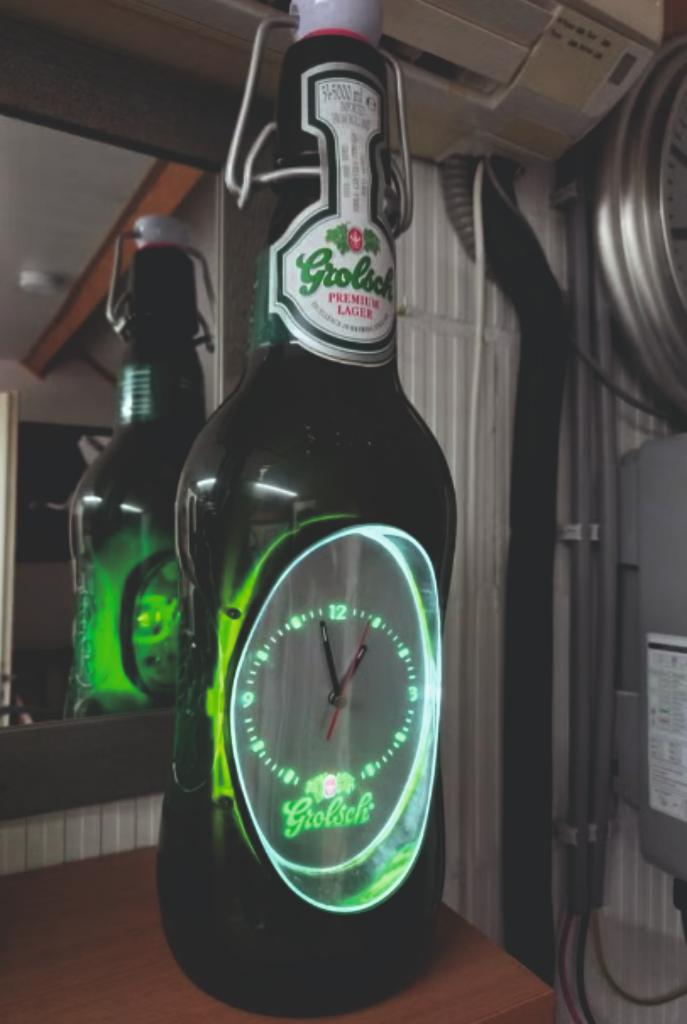 Grolsch bierfles met klok en verlichting., Ophalen of Verzenden, Gebruikt, Lichtbak of (neon) lamp
