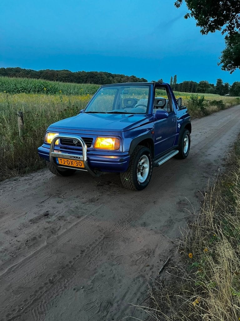 Suzuki Vitara 1.6 Cabrio 16V 4WD 1998 Blauw, Auto's, Stof, 40 €/maand, 4 cilinders, 1070 kg