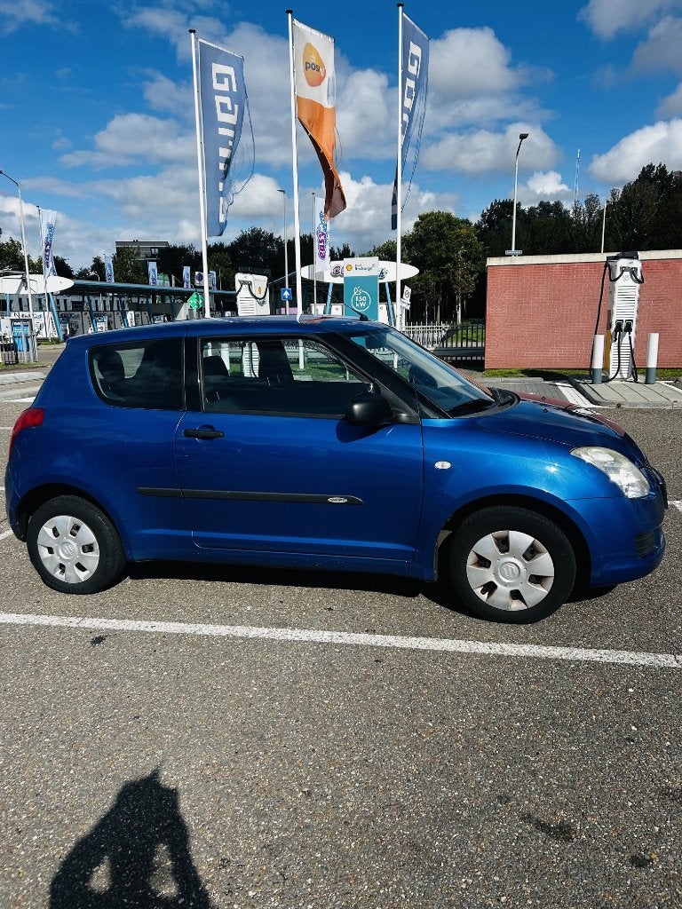 Suzuki Swift 1.3 3D 2009 Blauw, APK april 27, NAP, Dealer OH, Auto's, Dealer onderhouden, Swift, Origineel Nederlands, Handgeschakeld