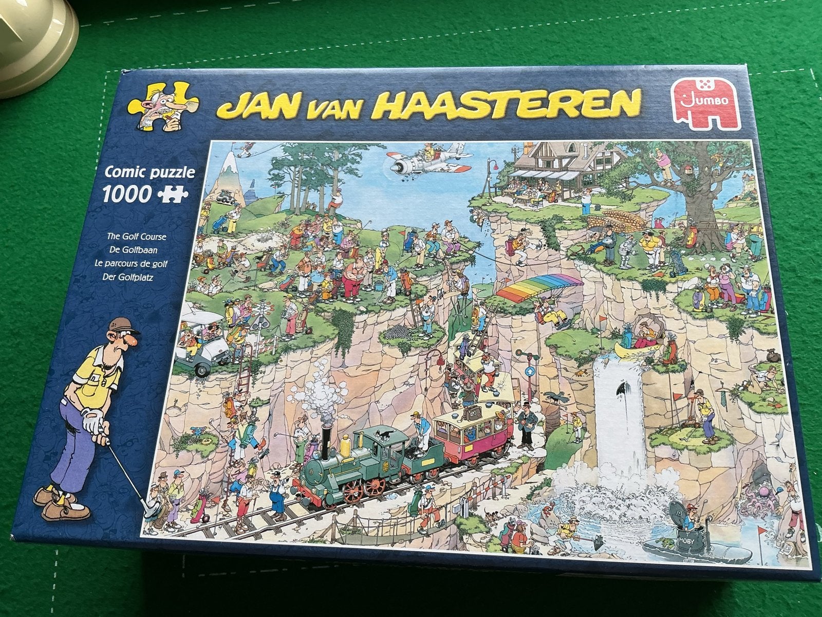 Jan van Haasteren De Golfbaan 1000 stukjes, Ophalen of Verzenden, 500 t/m 1500 stukjes, Zo goed als nieuw, Legpuzzel