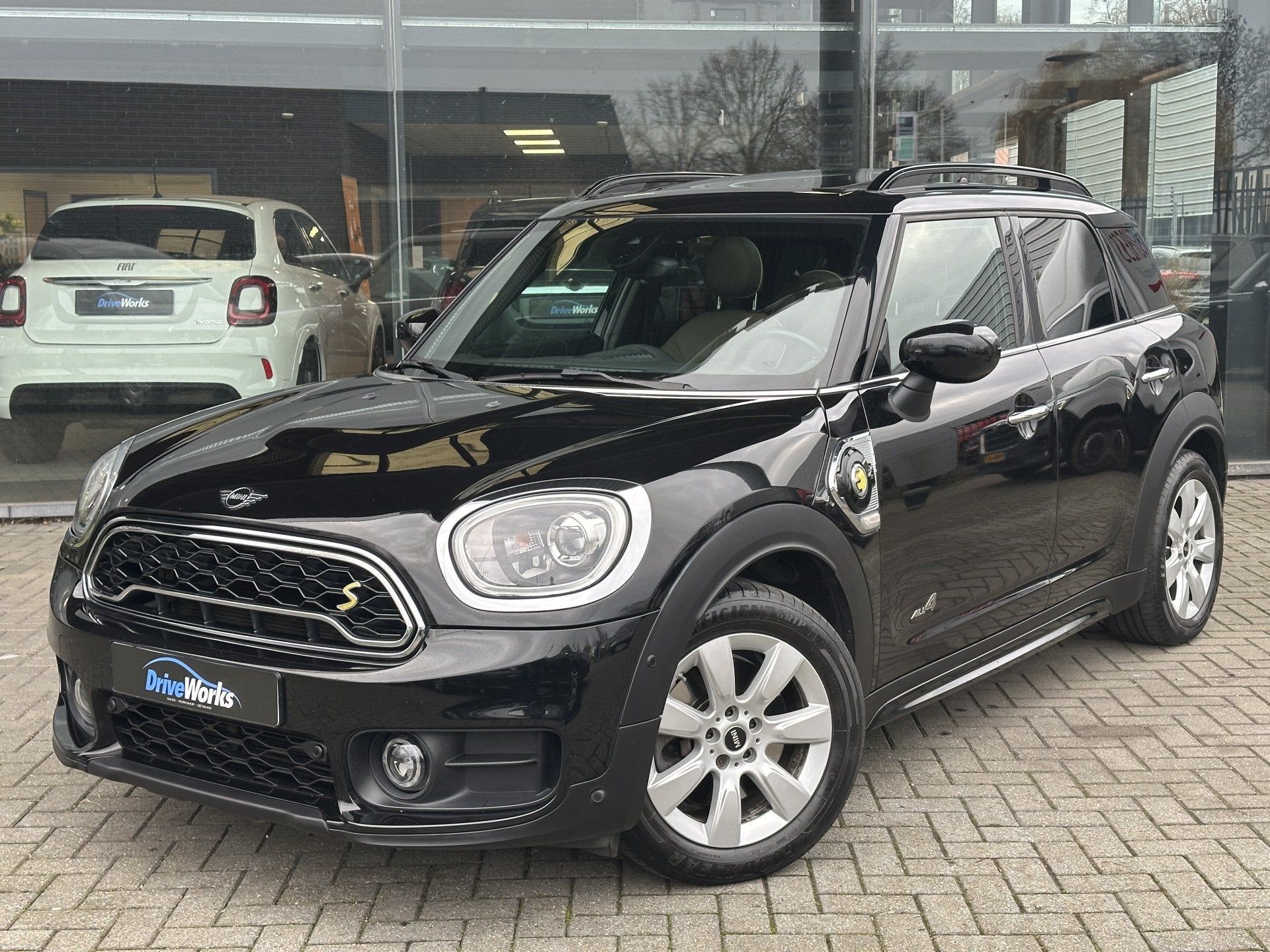 MINI Countryman 2.0 Cooper S E ALL4 Chili | Leer | Panorama, Auto's, Mini, Automaat, Gebruikt, Huisgarantie, Met garantie (alle)