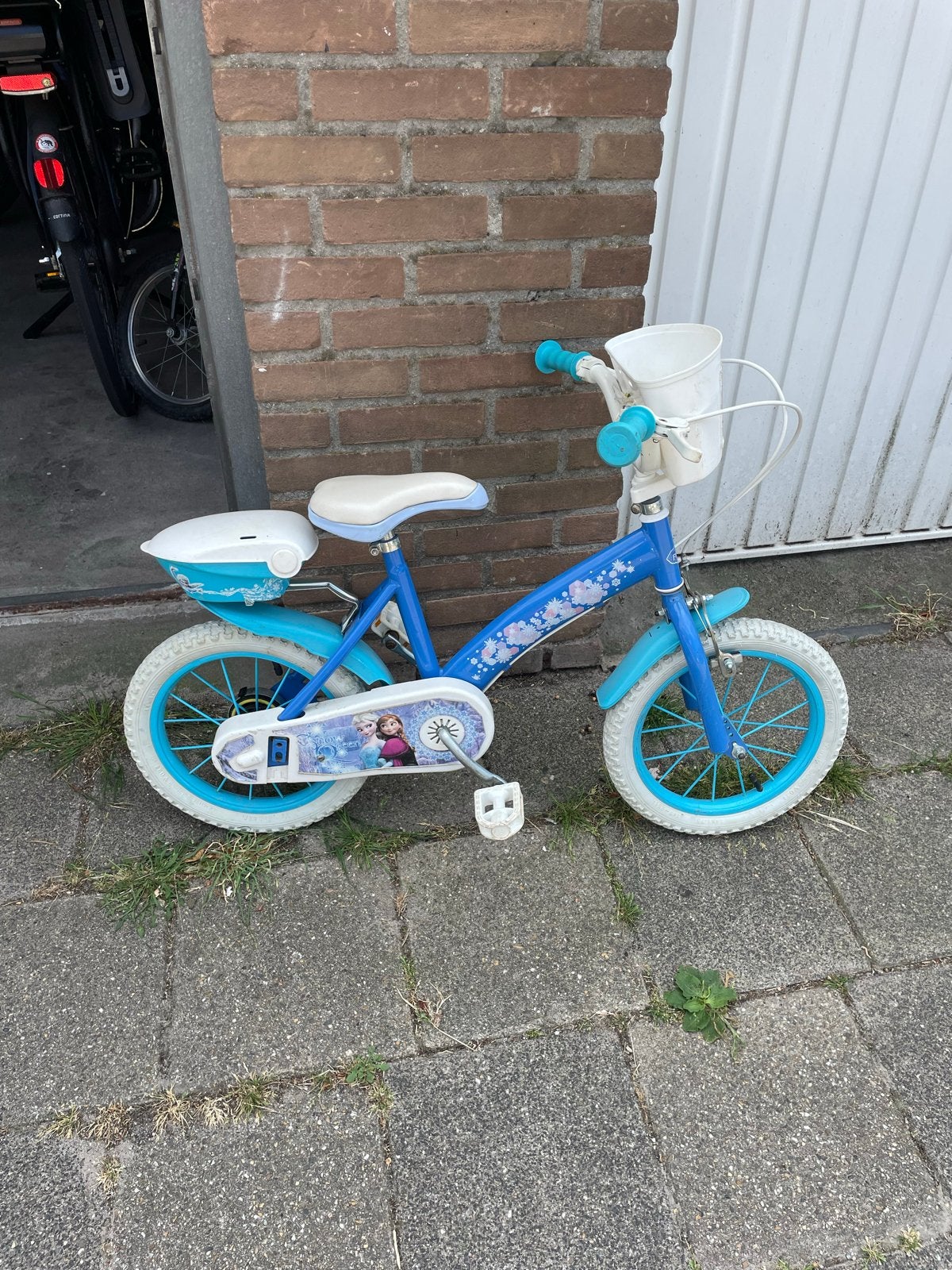Frozen kinderfiets 14 inch met mandje en poppenzitje, Ophalen, Gebruikt, Velgrem, Minder dan 16 inch